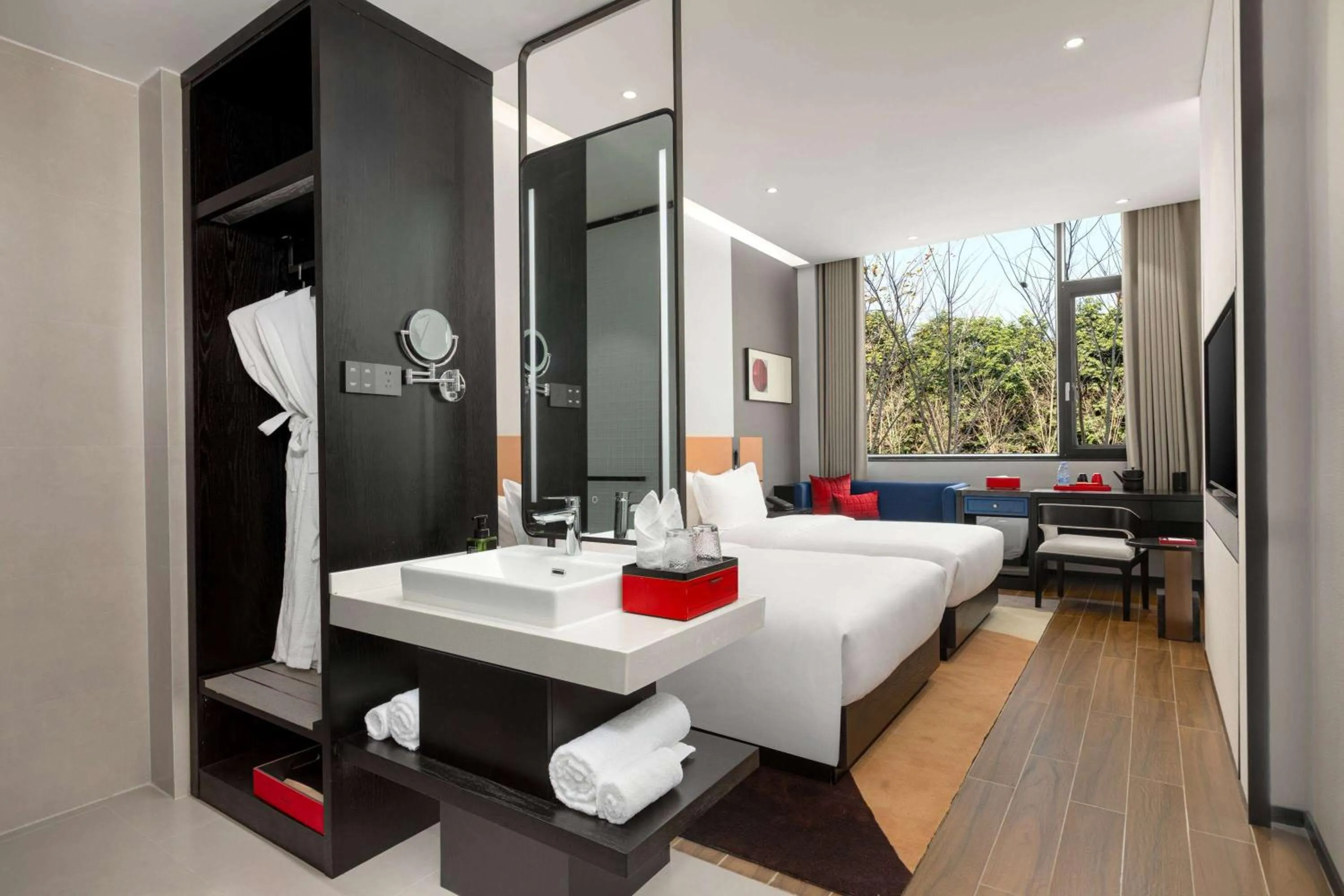 Photo of the whole room, Bed in Ramada by Wyndham Xishuangbanna Jinghong