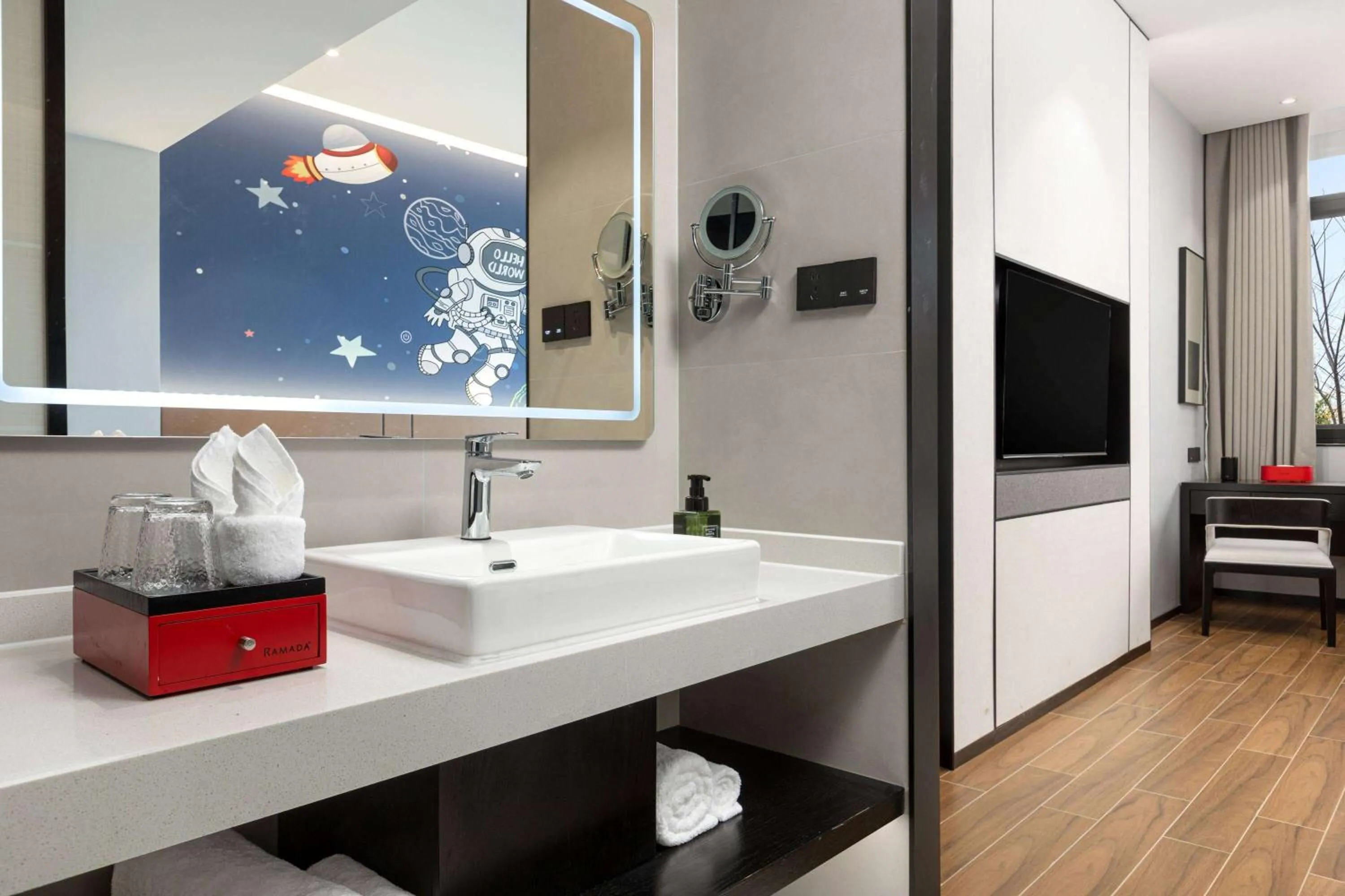 Photo of the whole room in Ramada by Wyndham Xishuangbanna Jinghong