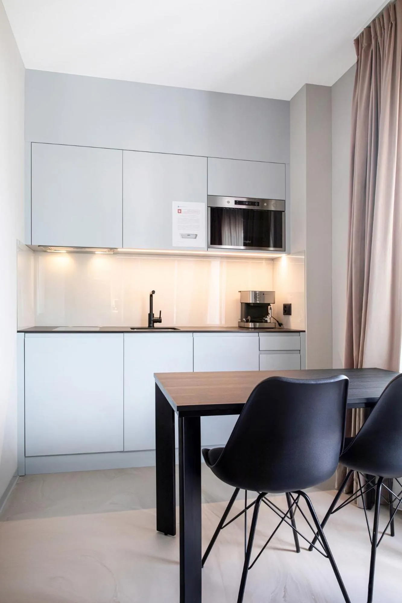Kitchen or kitchenette in VISIONAPARTMENTS Lugano - contactless check-in