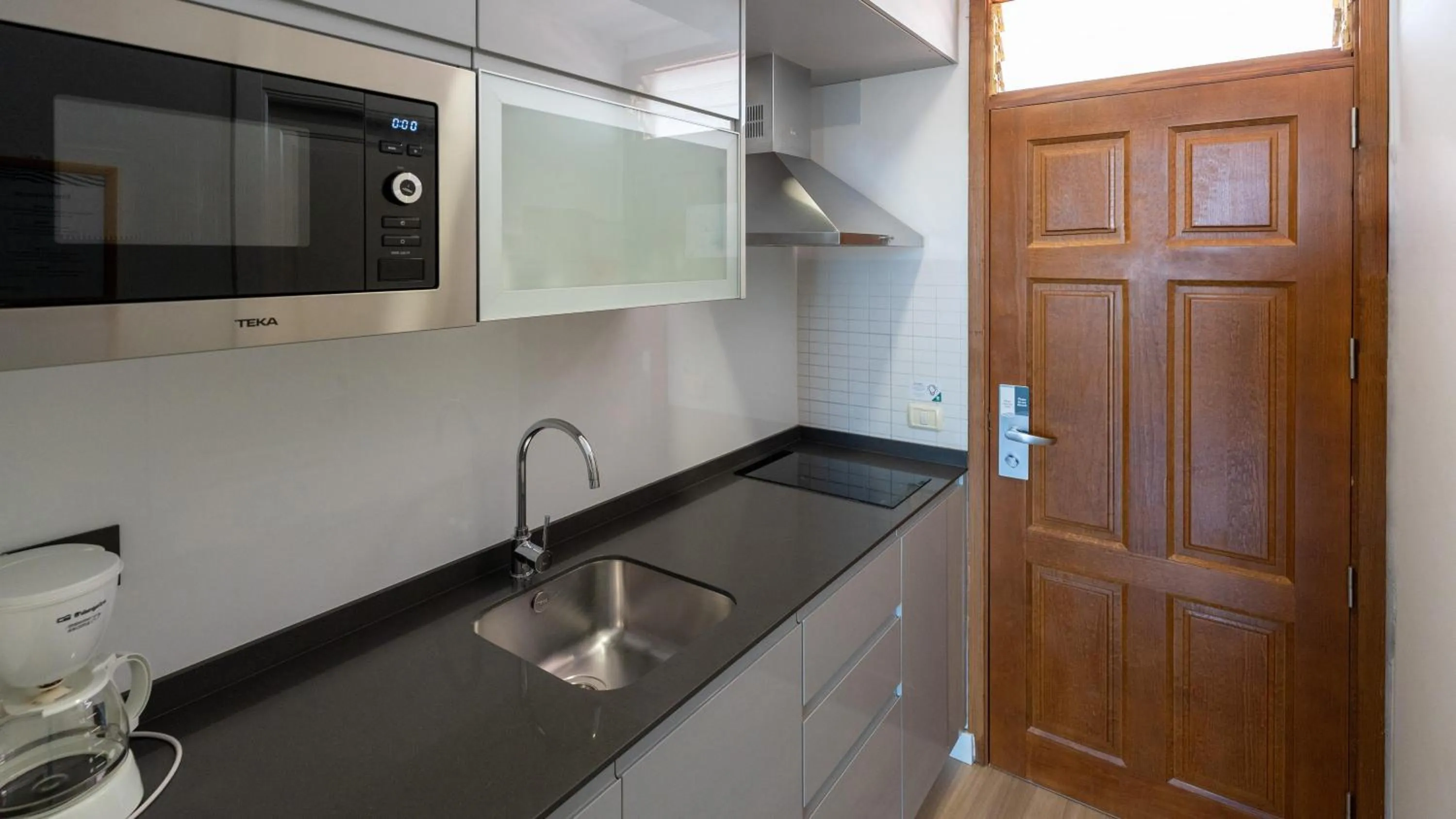 Kitchen or kitchenette in Coral Suites & Spa - Adults Only