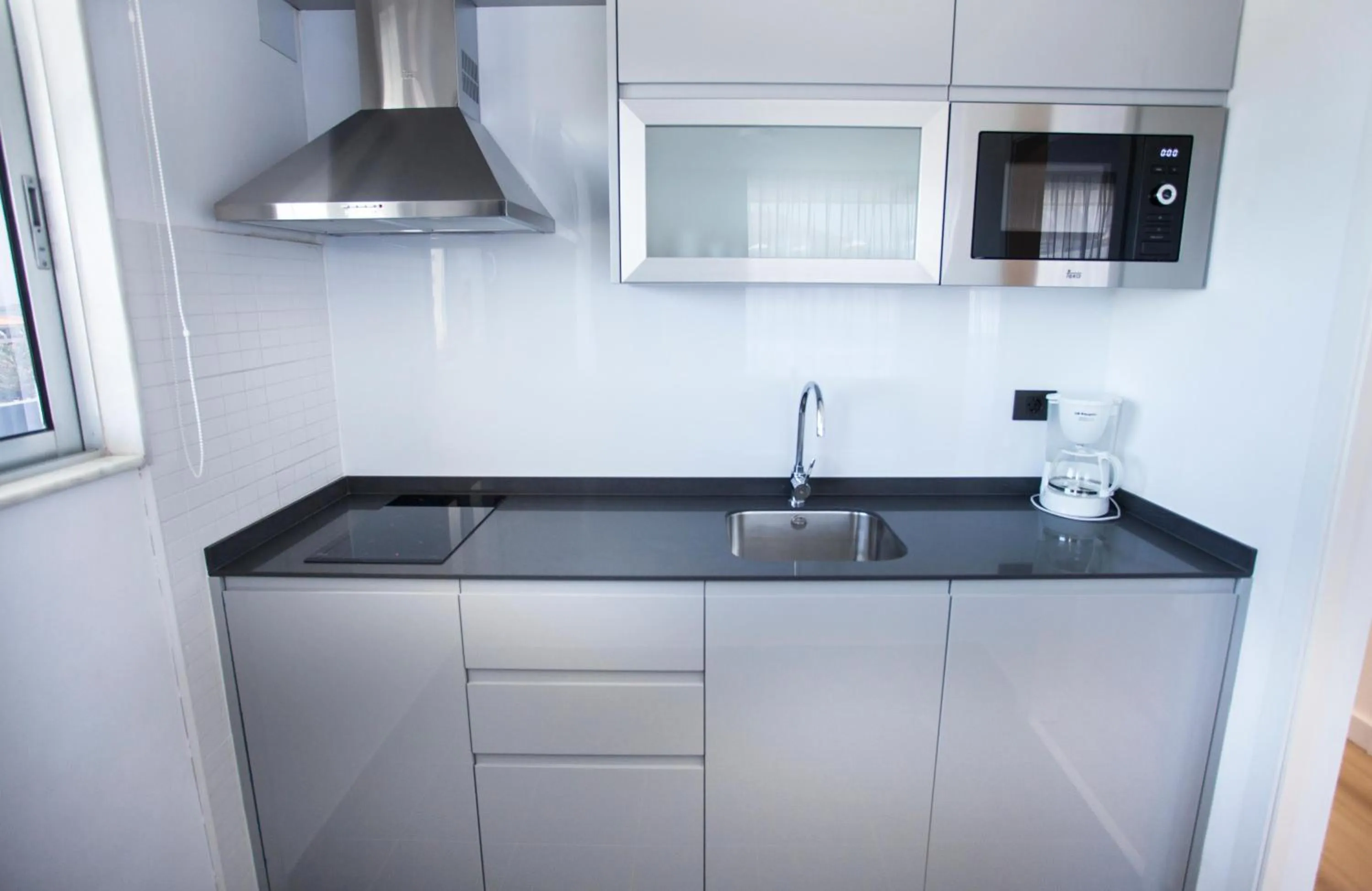 Kitchen or kitchenette in Coral Suites & Spa - Adults Only