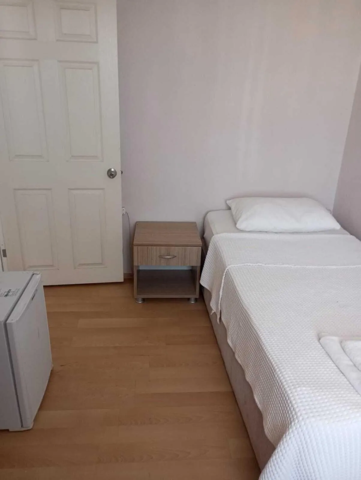 Bed in Kalanora Resort Hotel