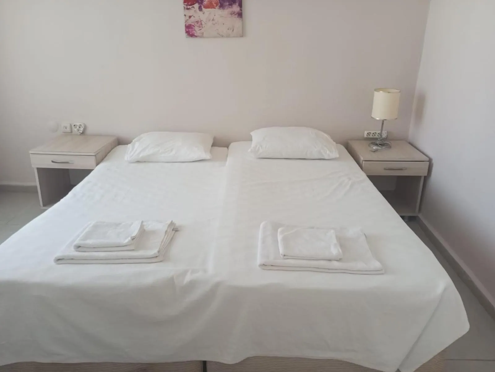 Bed in Kalanora Resort Hotel