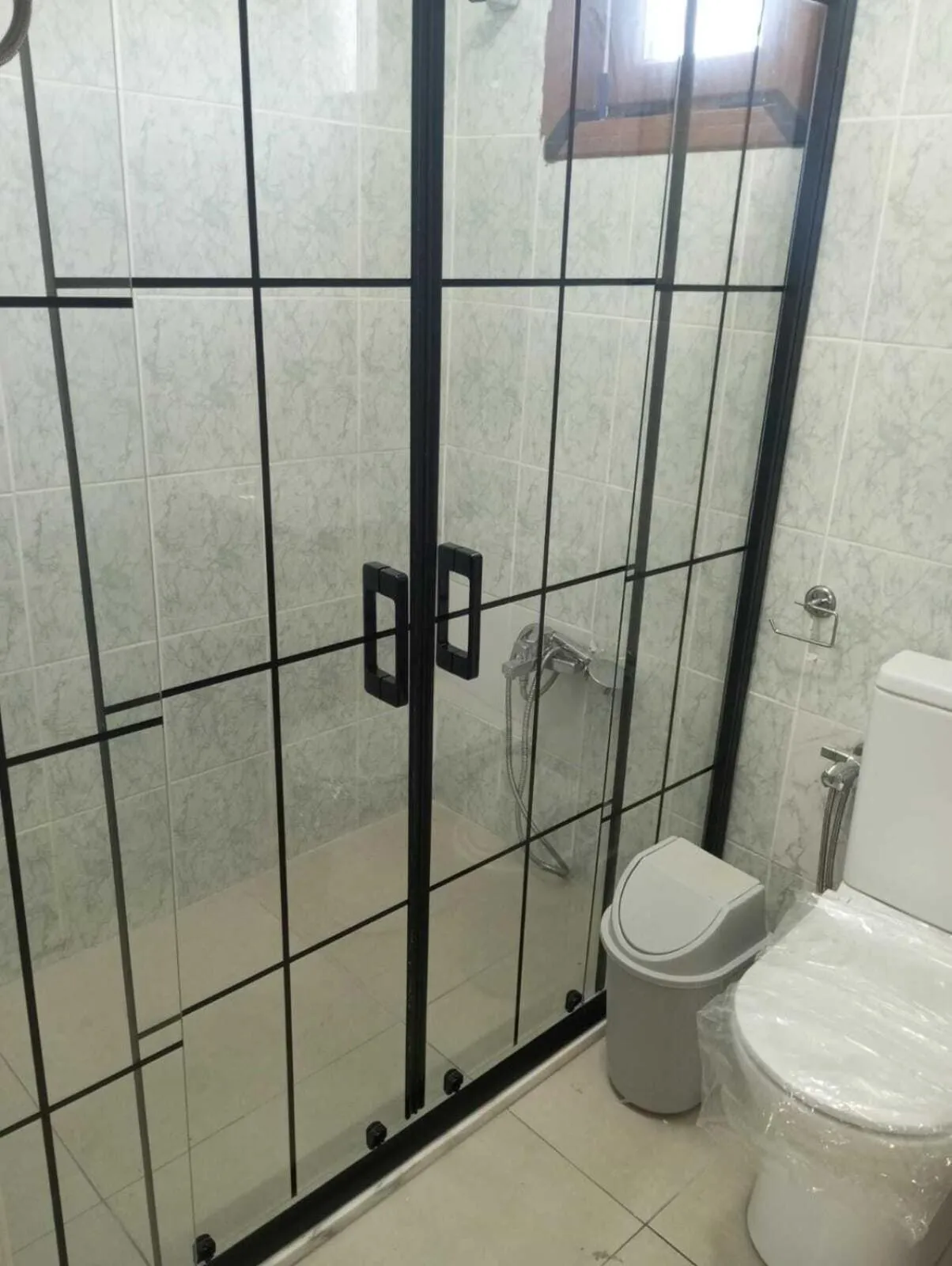 Shower in Kalanora Resort Hotel