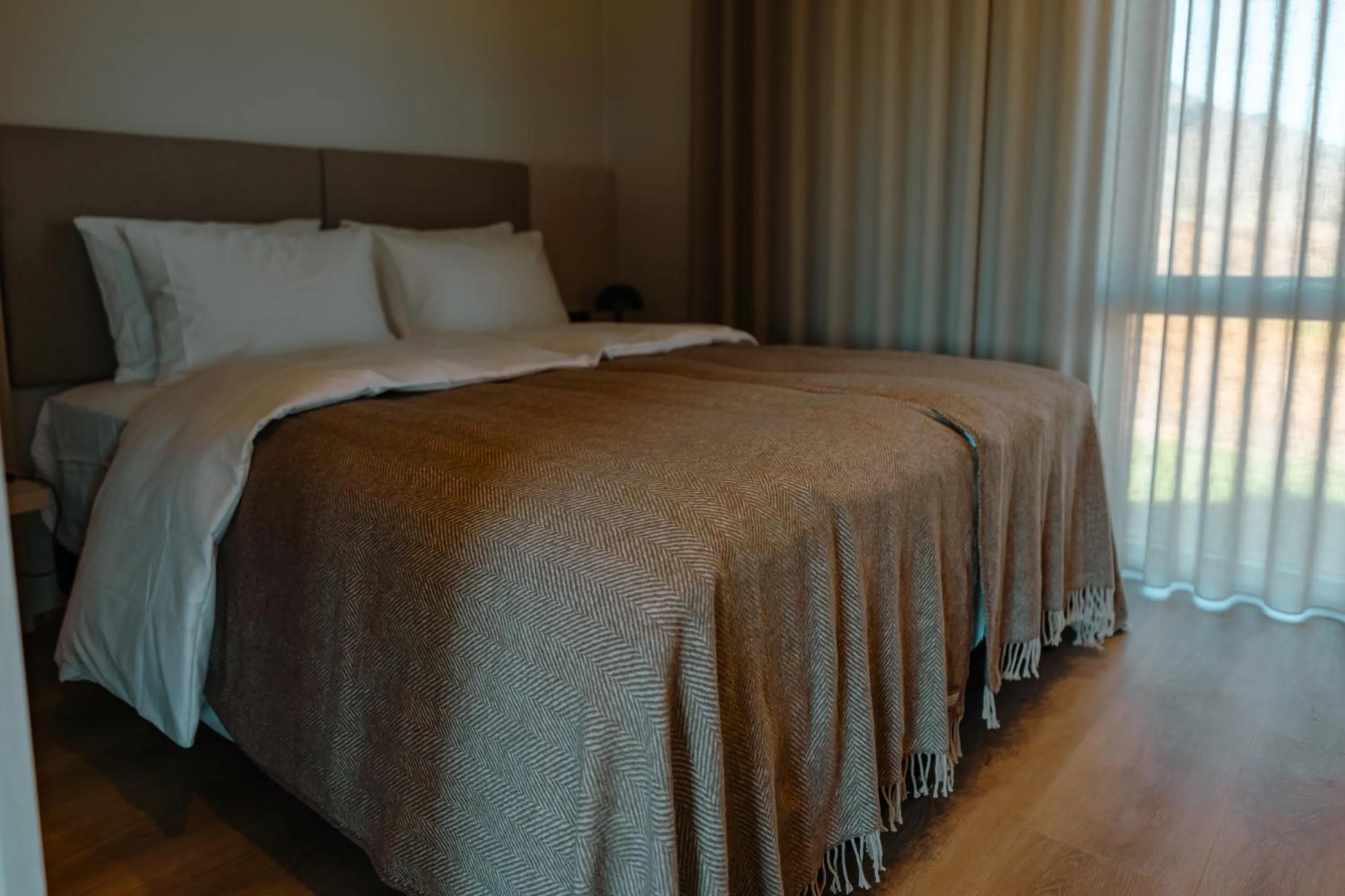 Bed in Peninsula Suites