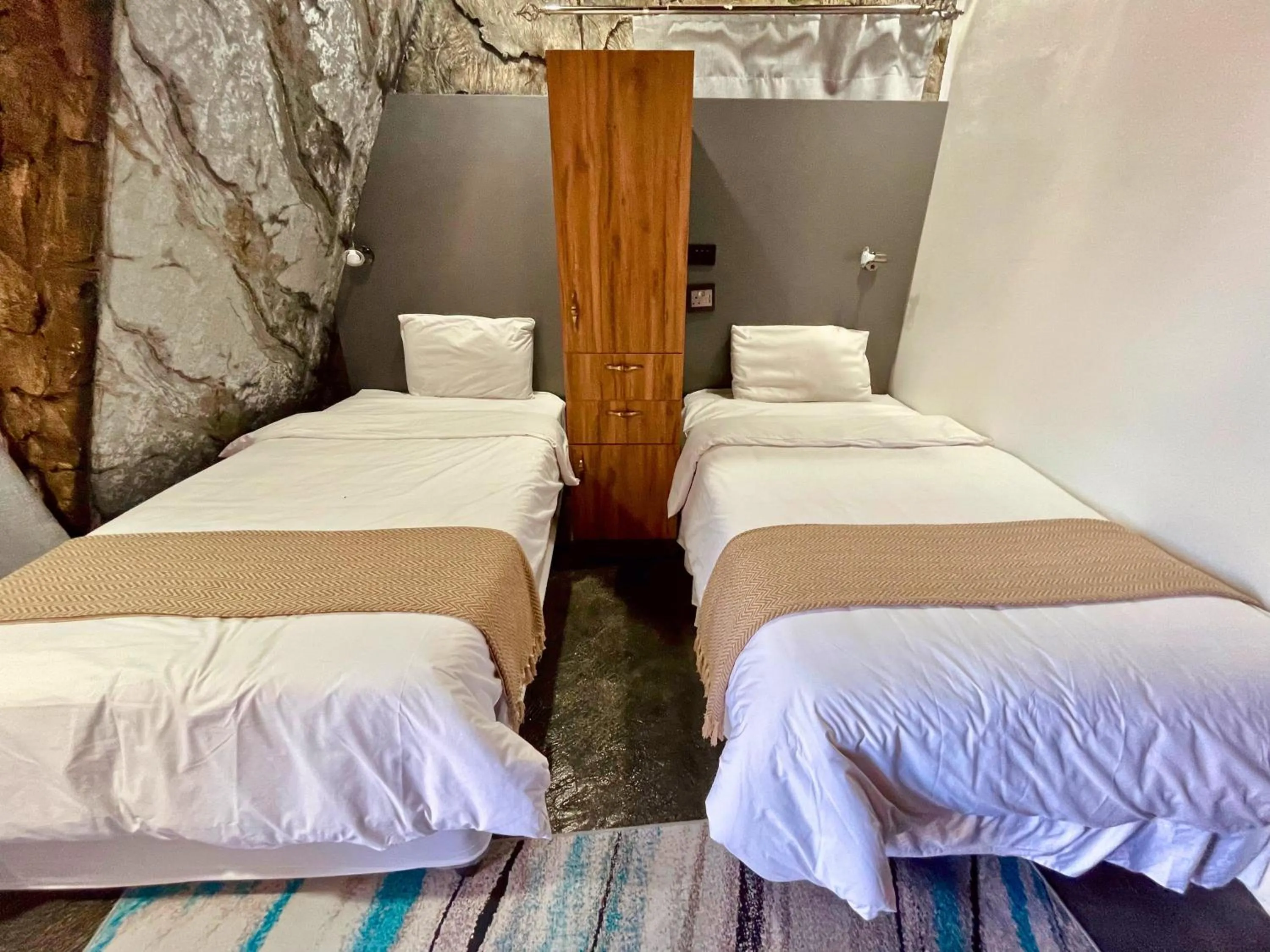 Bed in Rustiek Hotel