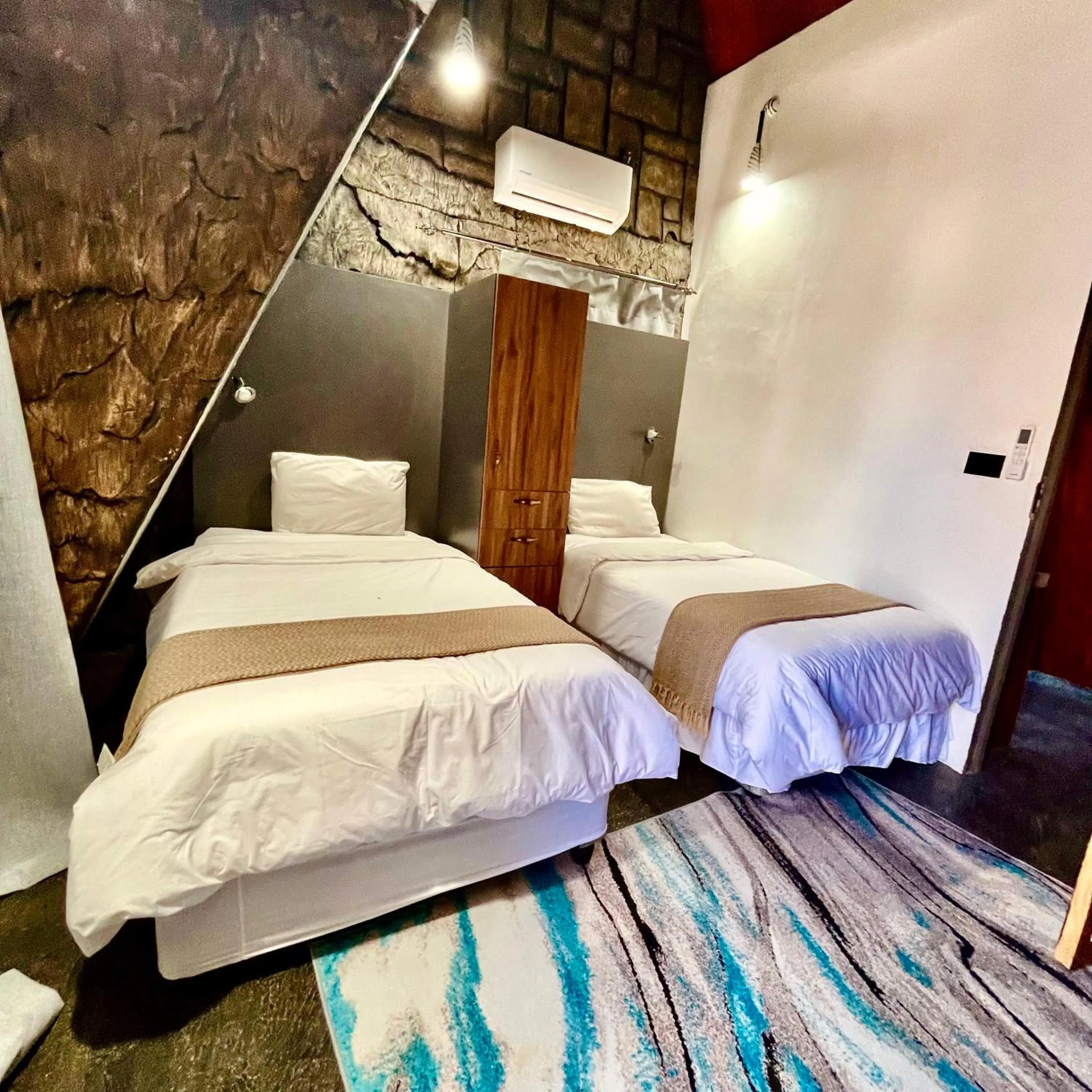 Bed in Rustiek Hotel