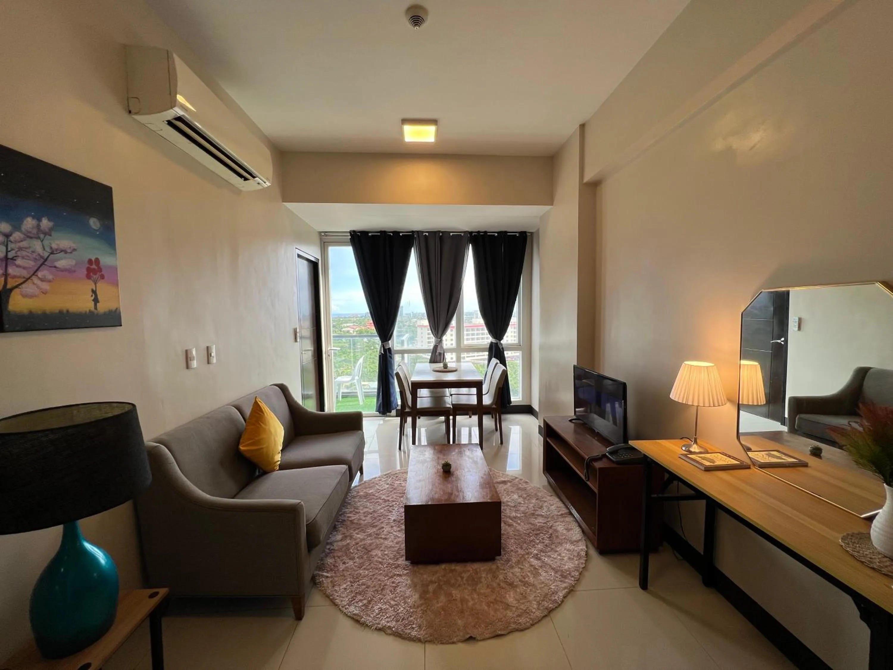 TV and multimedia in Mactan Newtown A by Isla Stays