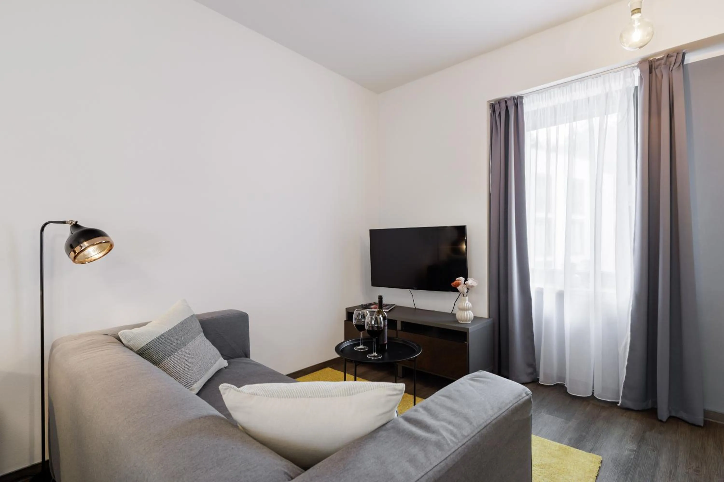 Communal lounge/ TV room in River Apartments