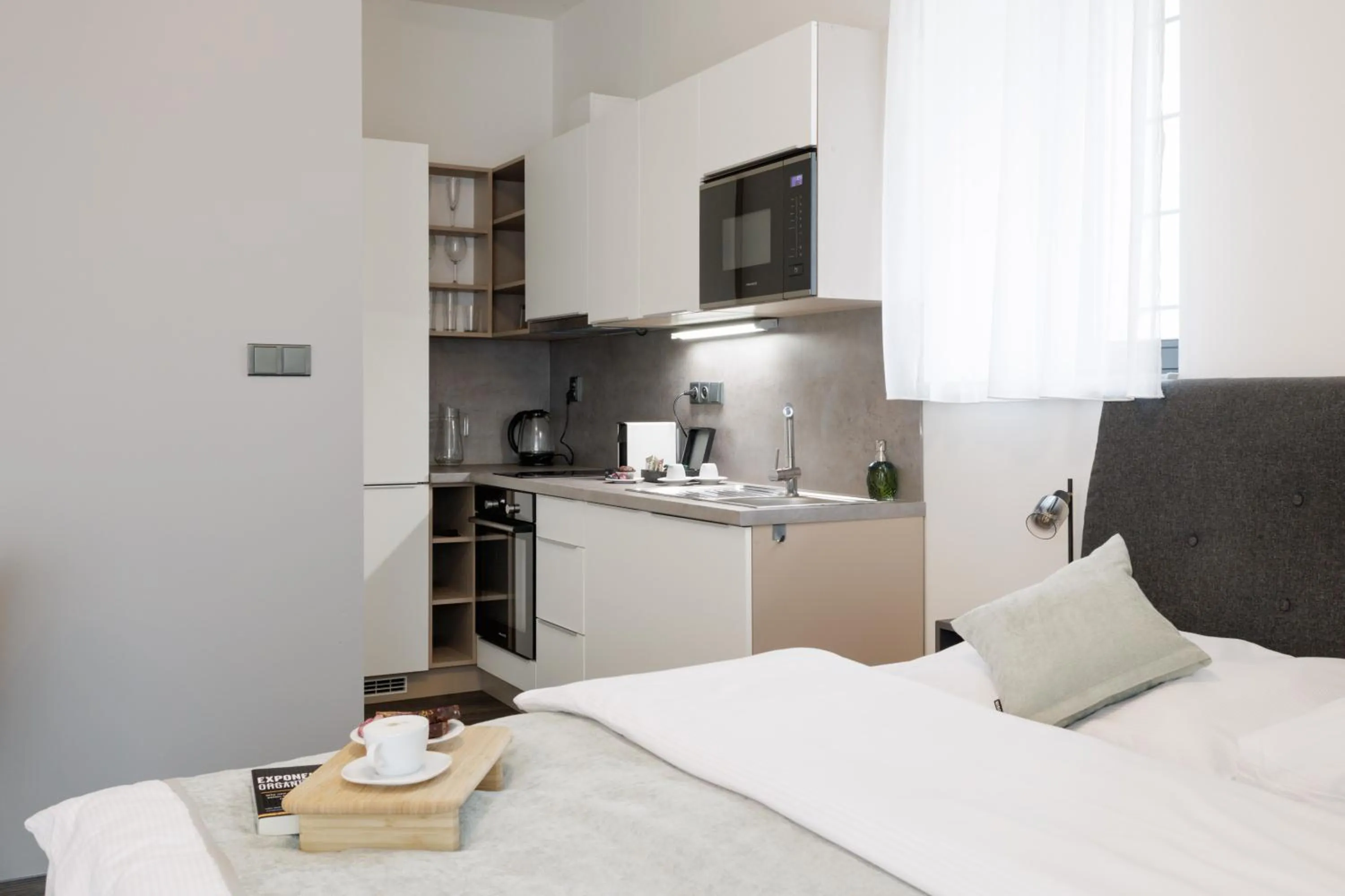 Bed in River Apartments