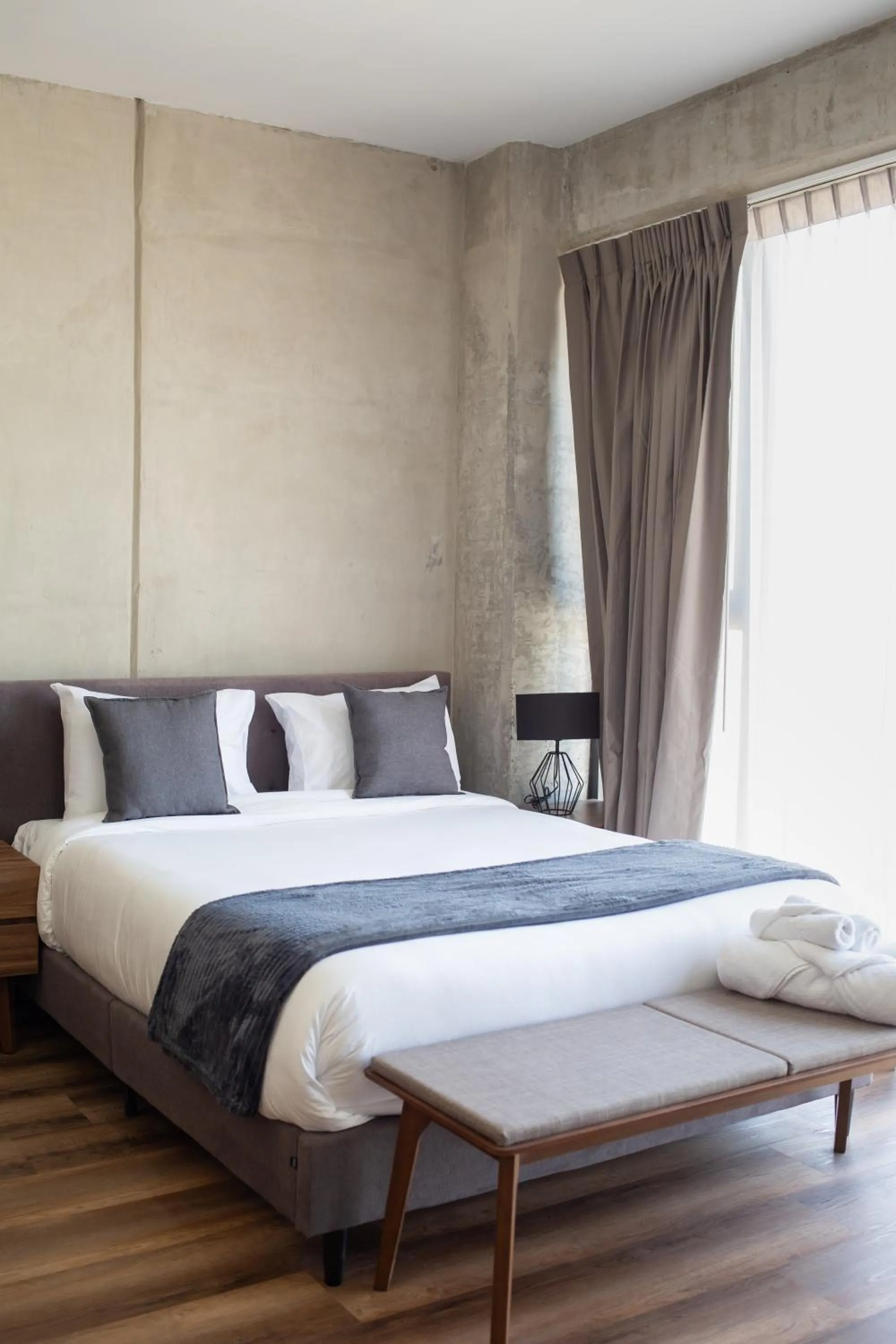 Bed in Suites del Carmen Consulado