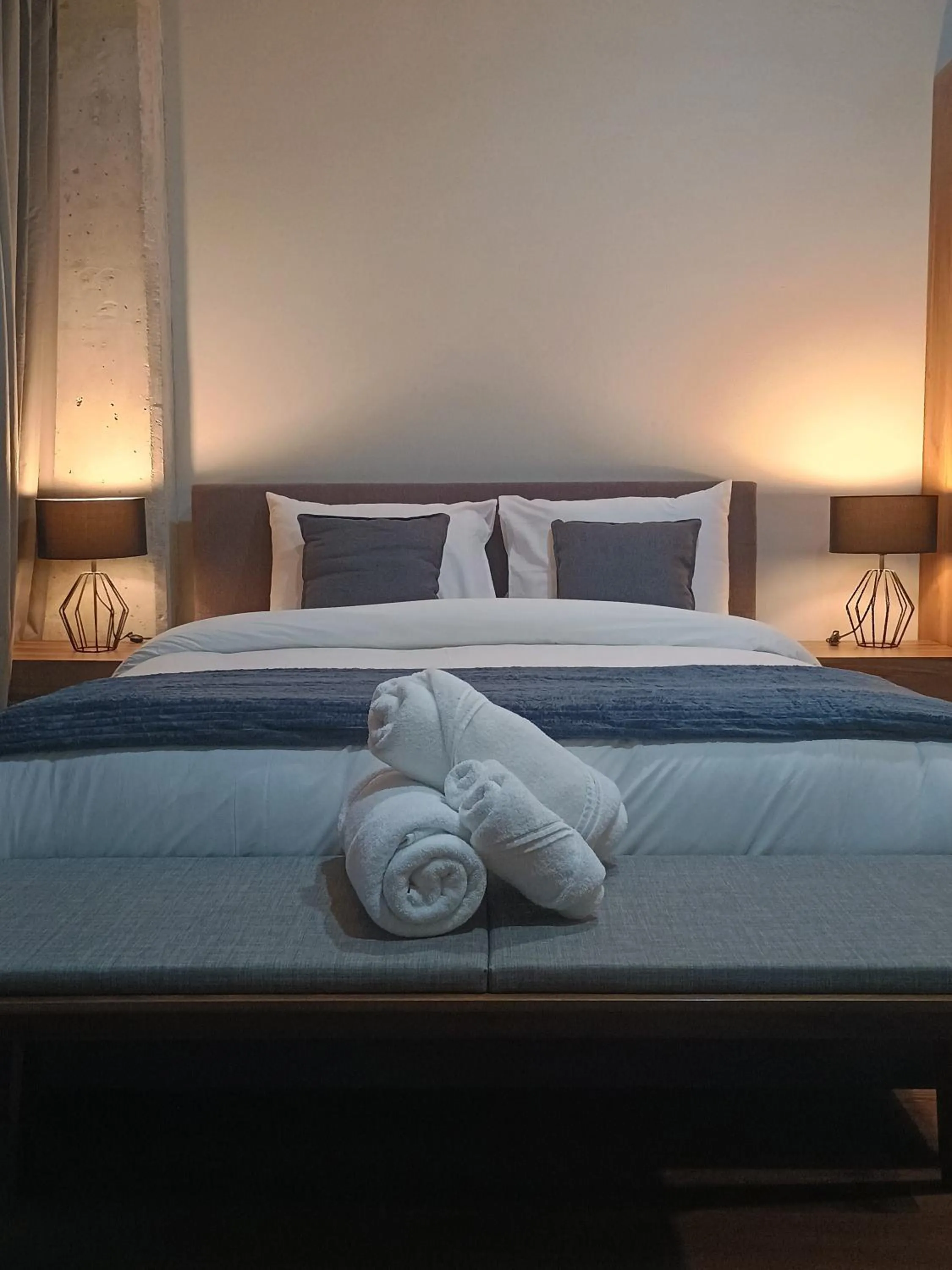 Bed in Suites del Carmen Consulado