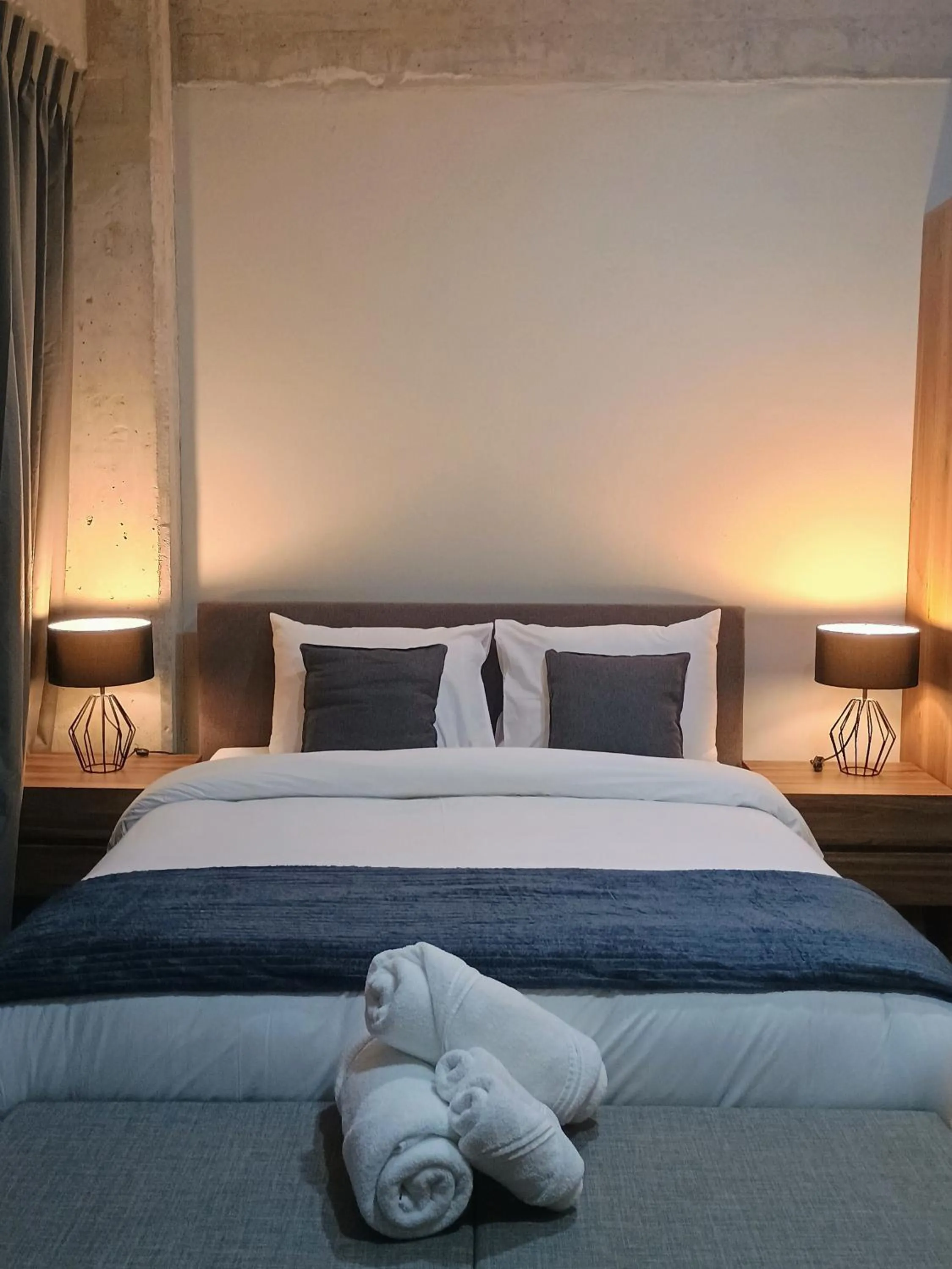 Bed in Suites del Carmen Consulado