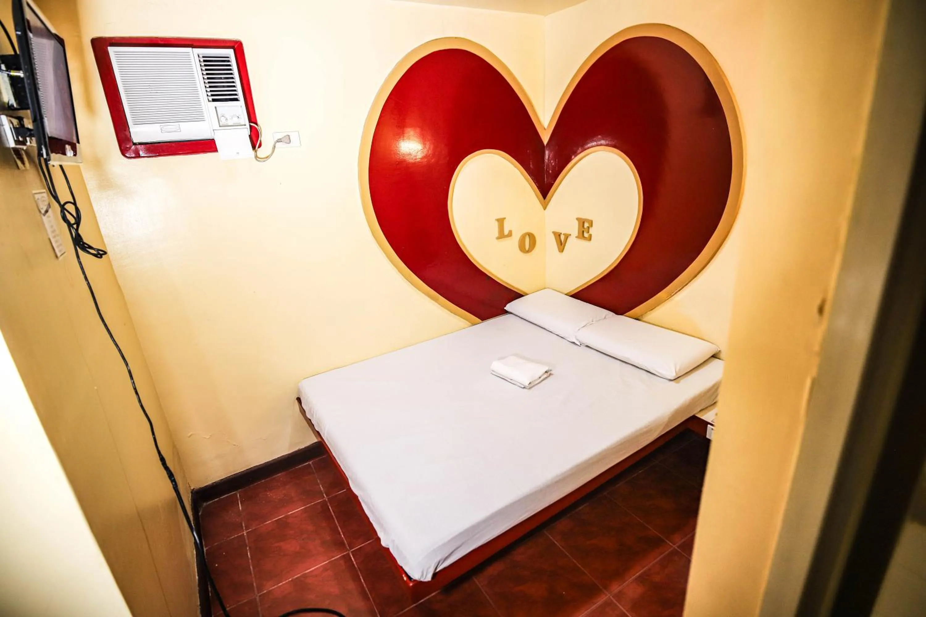 Bed in Astrotel Novaliches