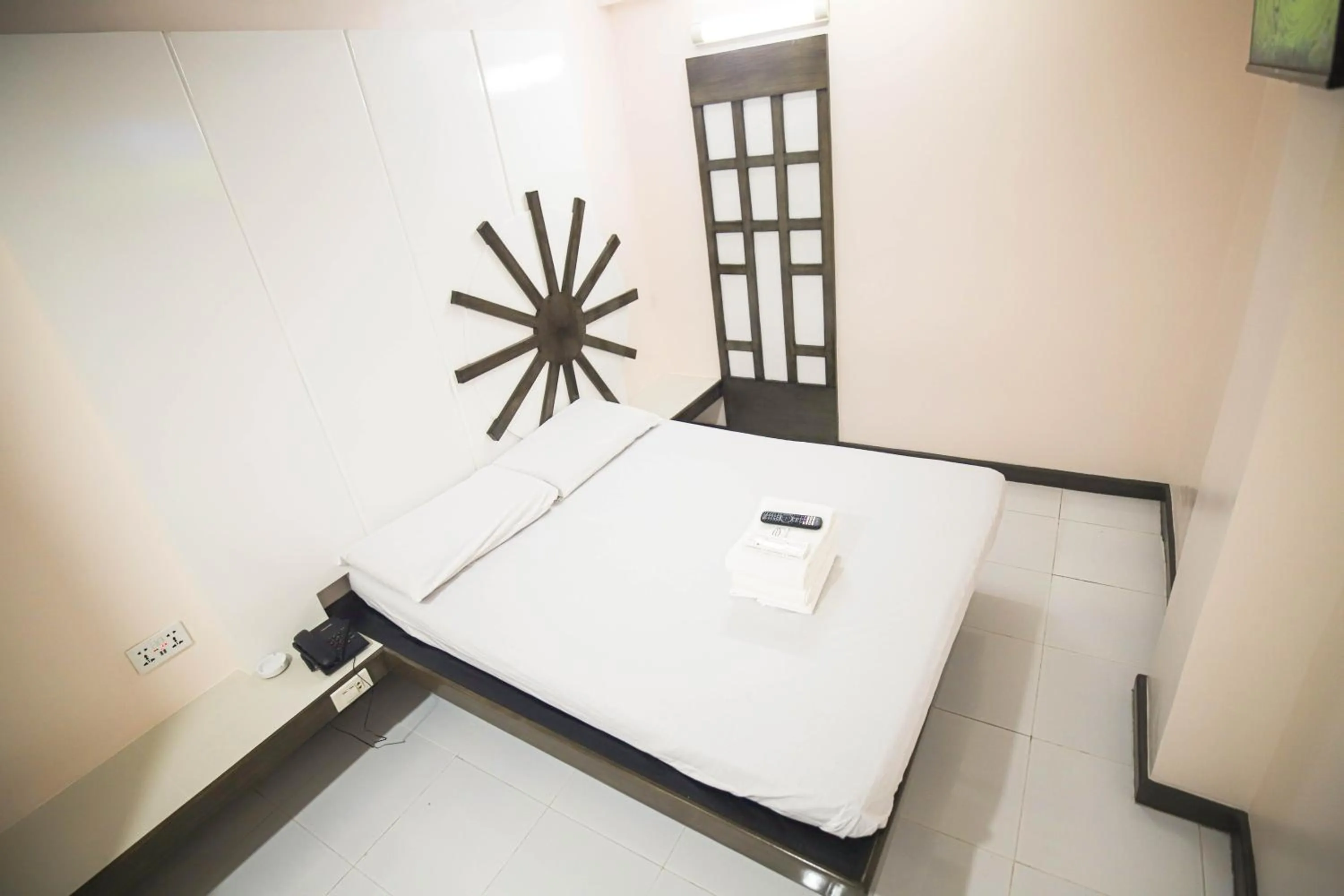 Bed in Astrotel Calamba