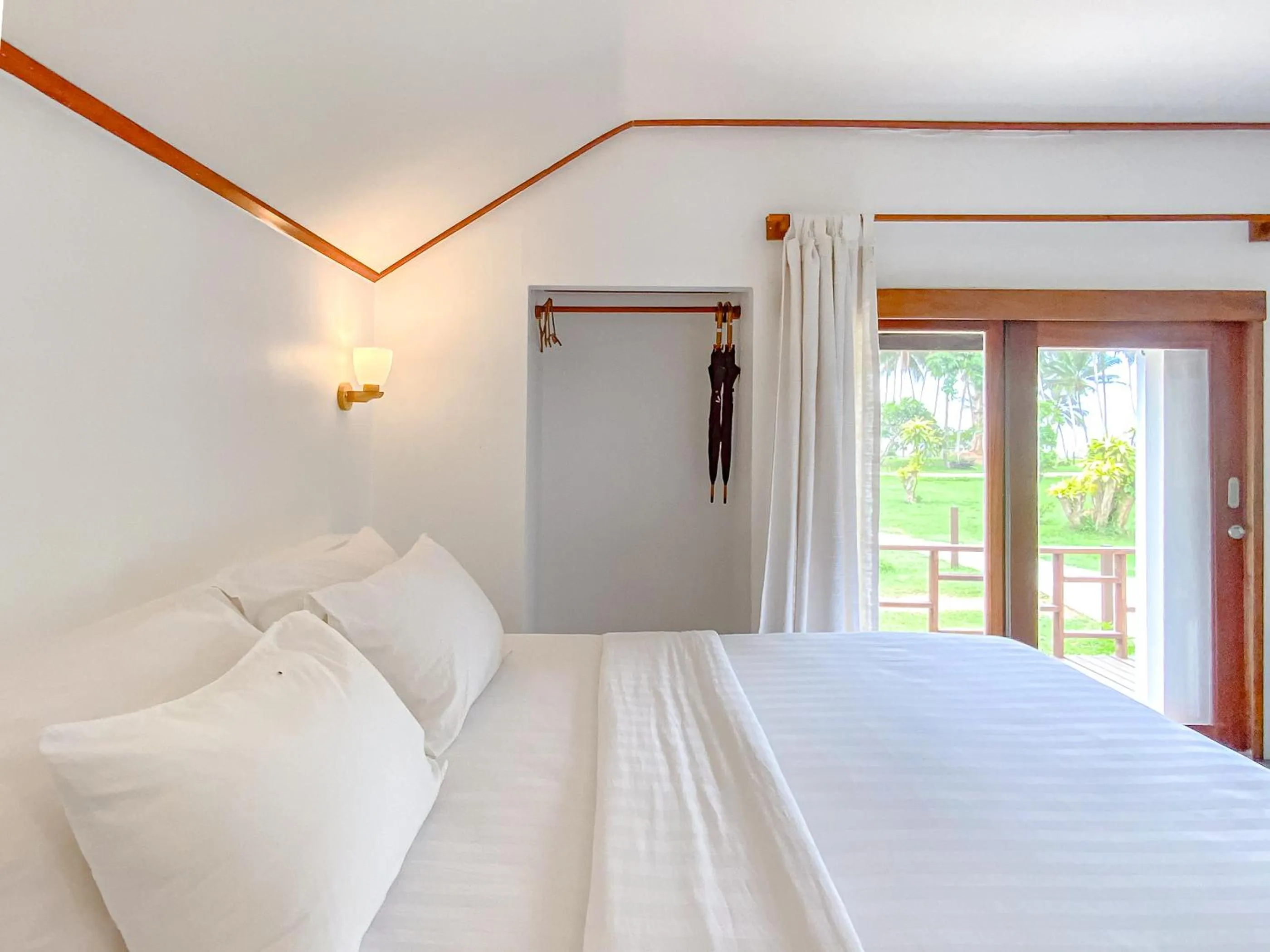 Bed in Chumphon Cabana Resort