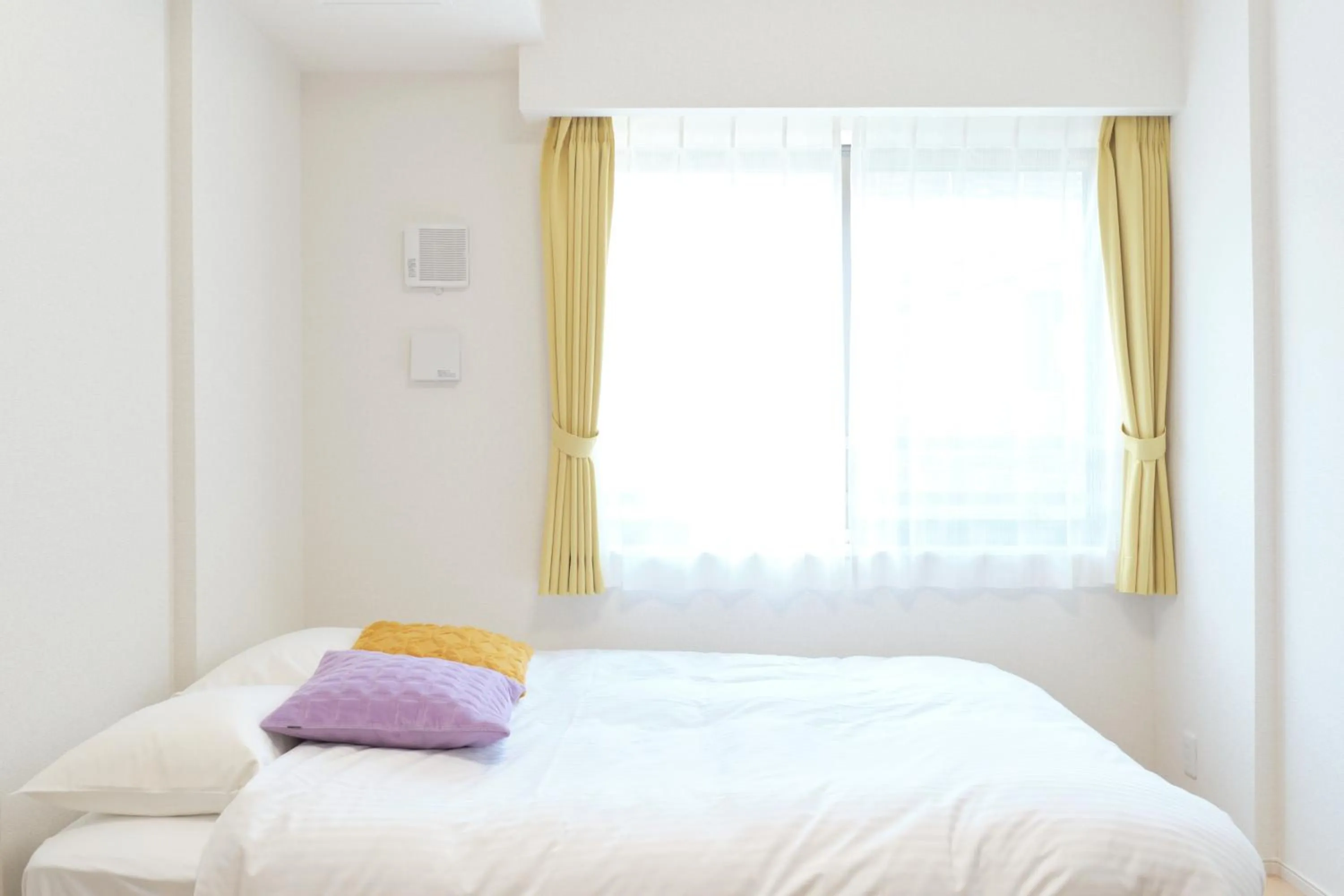 Bed in J-ARC Akebonobashi by Tranova