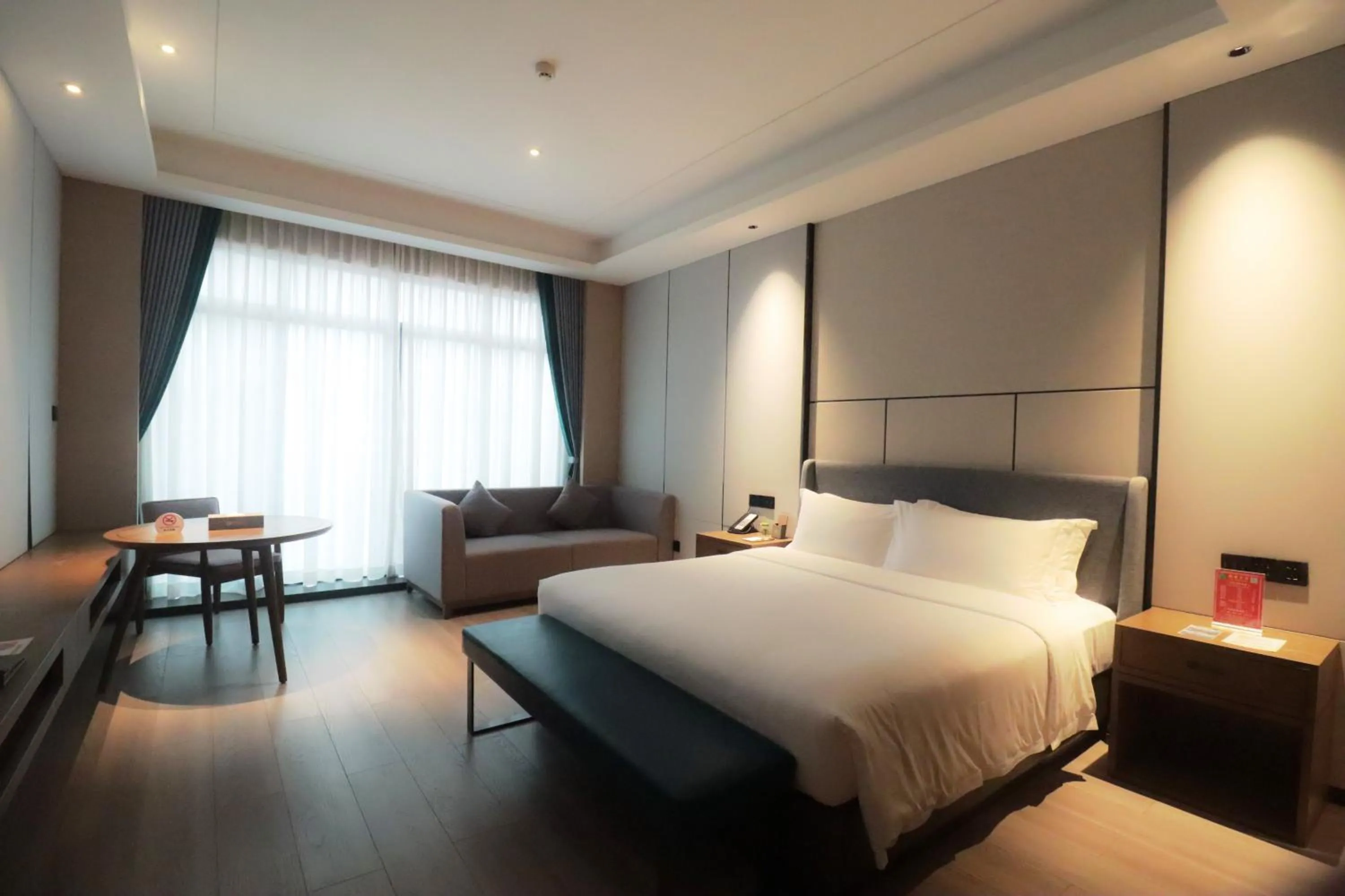 Photo of the whole room, Bed in DongHu Resort Hotel