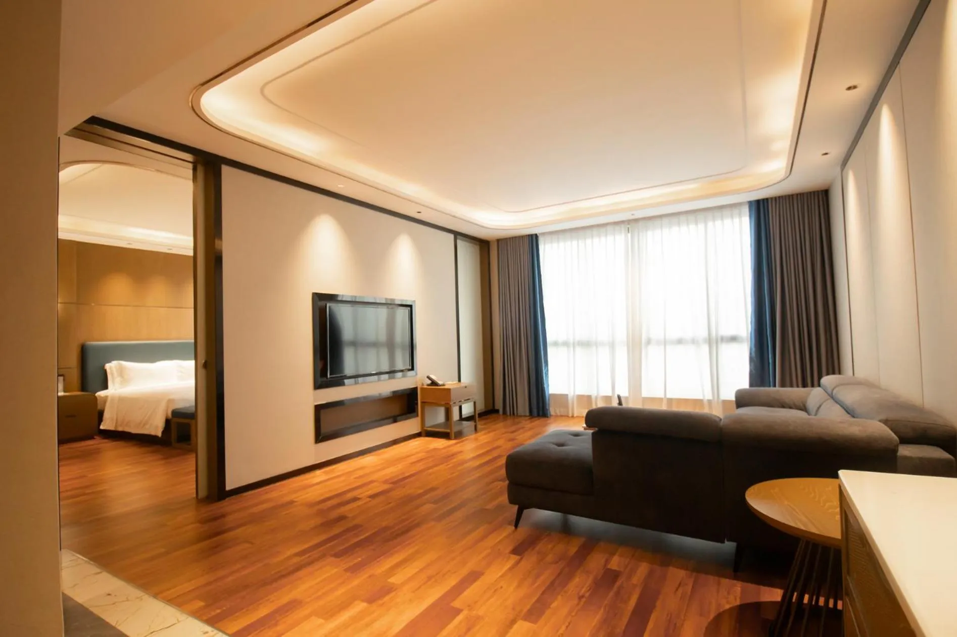 Living room, Bed in DongHu Resort Hotel