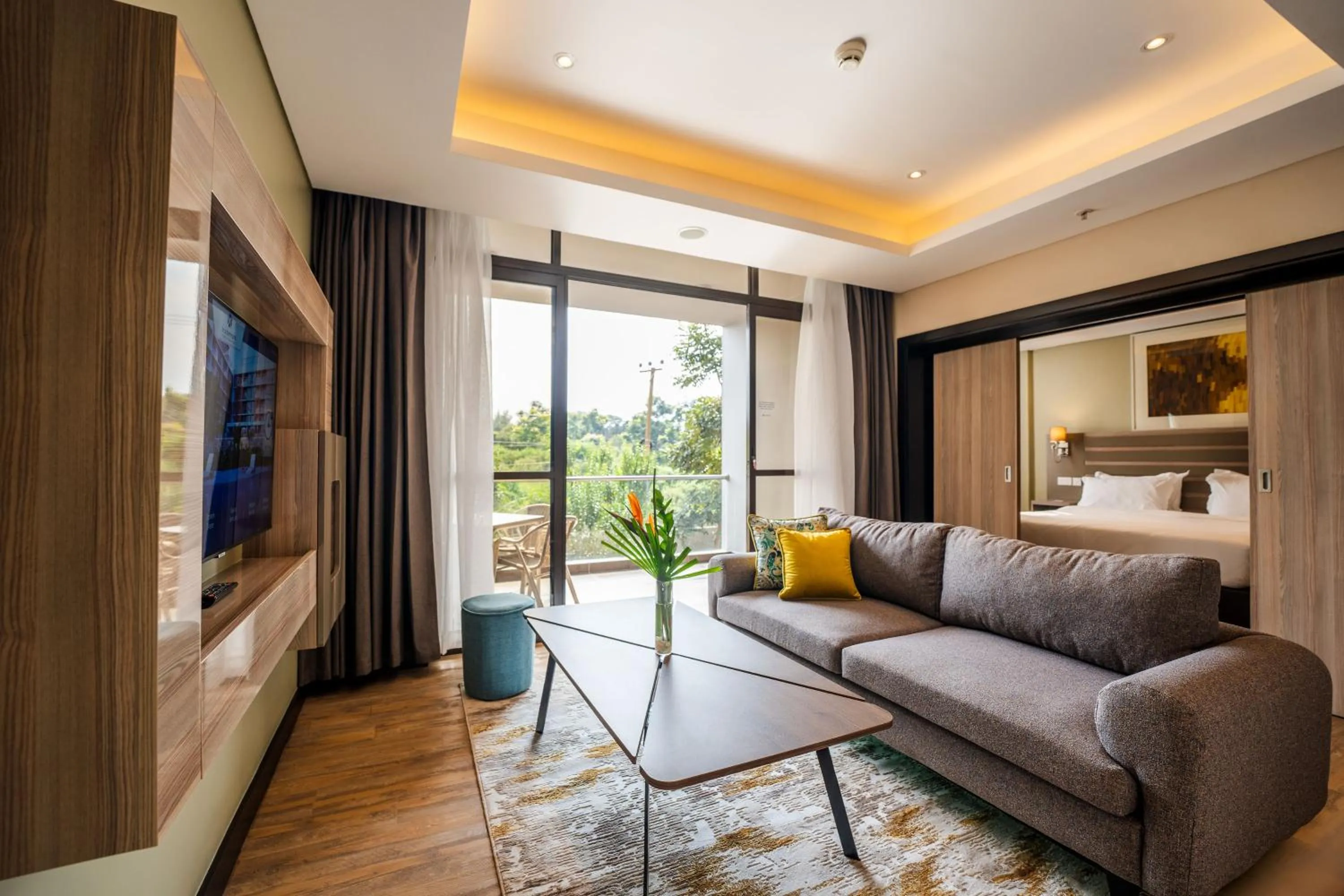 Living room in Trademark Suites at Enaki Town