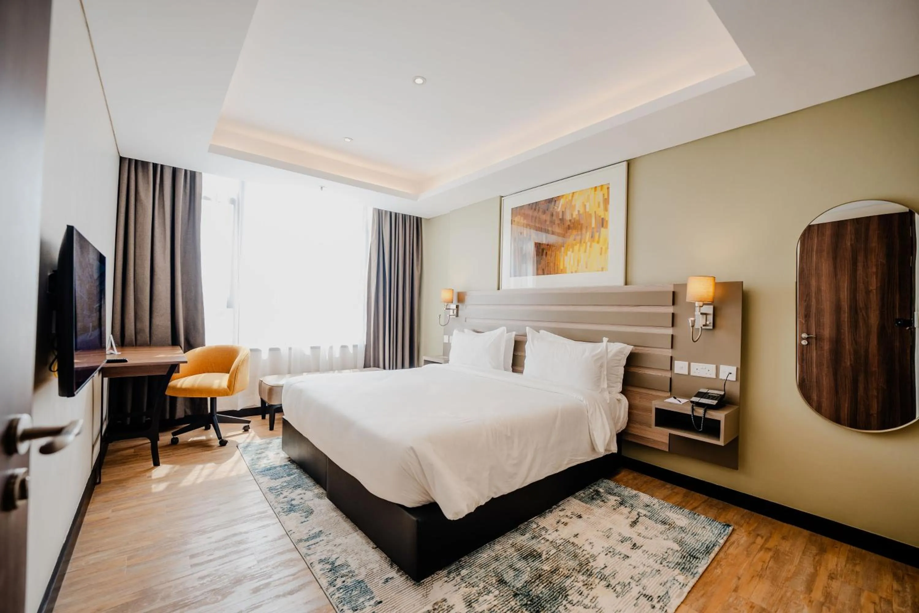 Bedroom, Bed in Trademark Suites at Enaki Town