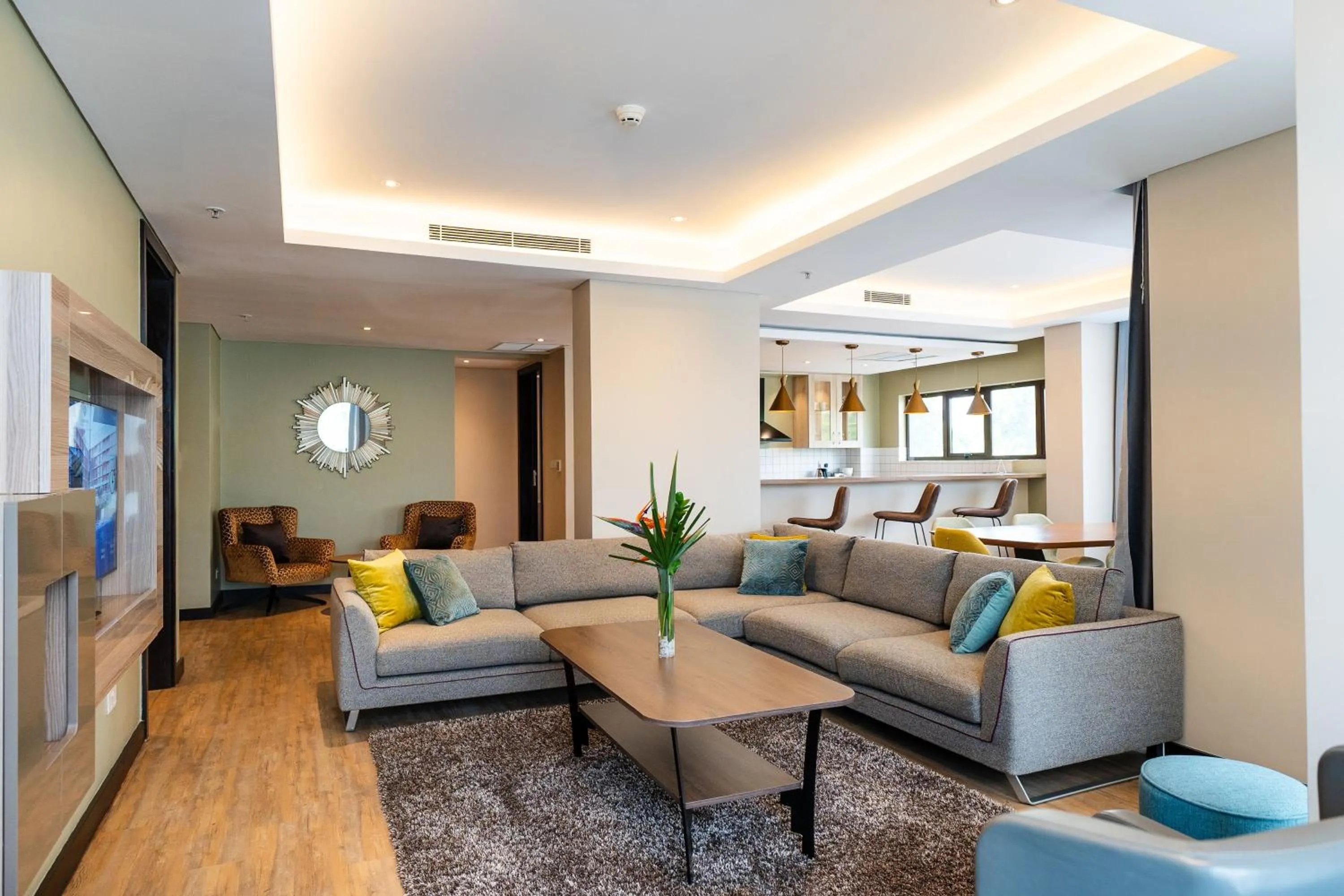 Living room in Trademark Suites at Enaki Town