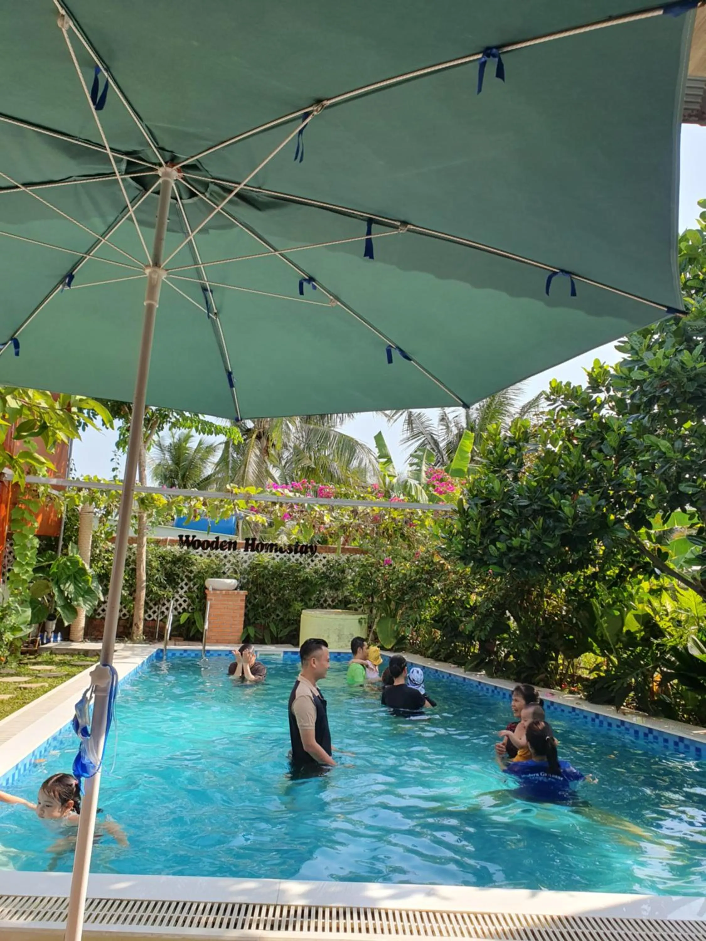 Swimming pool in Wooden Homestay LAGI