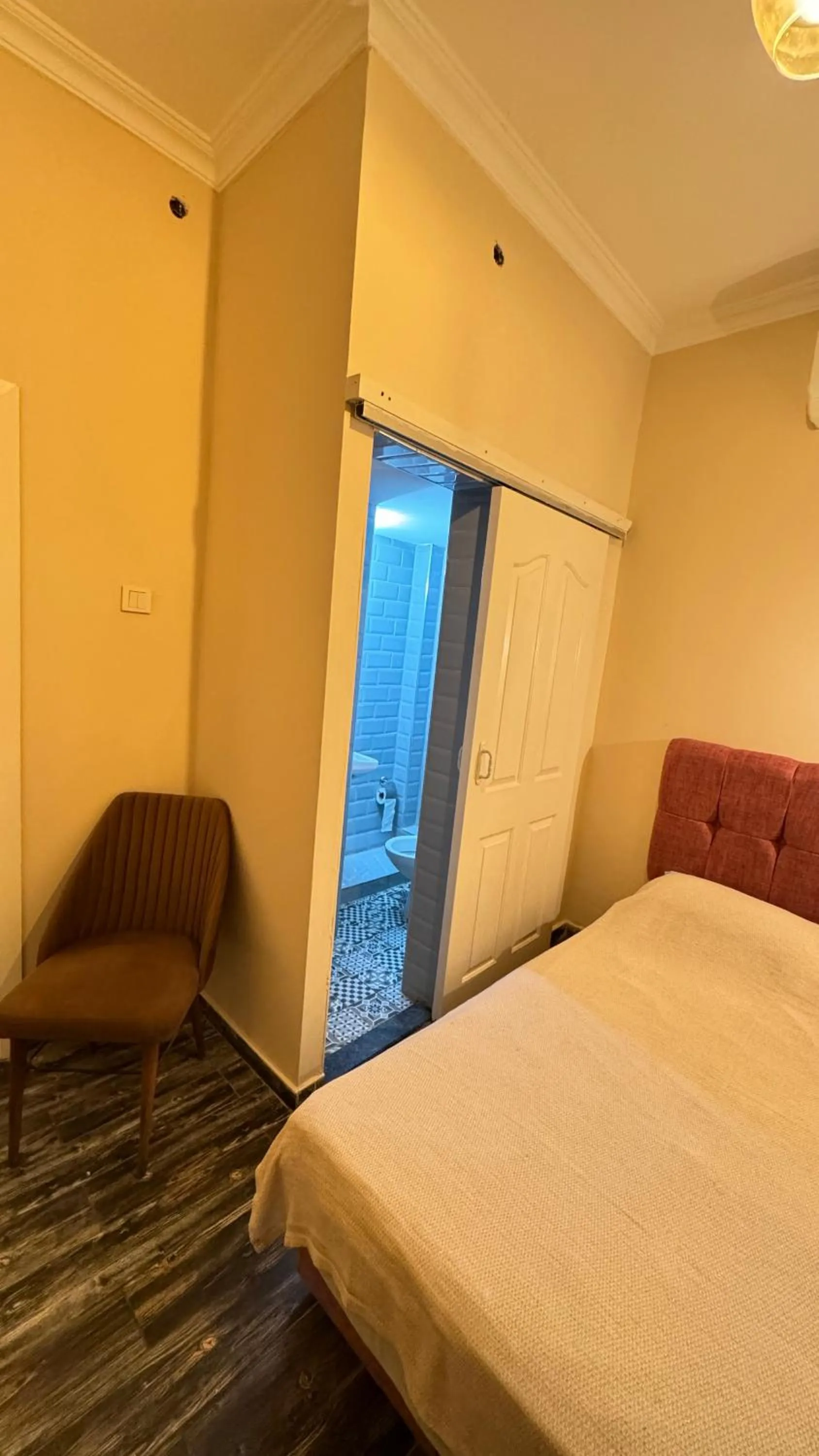 Bed in Callisto Pub & Kitchen & Hotel