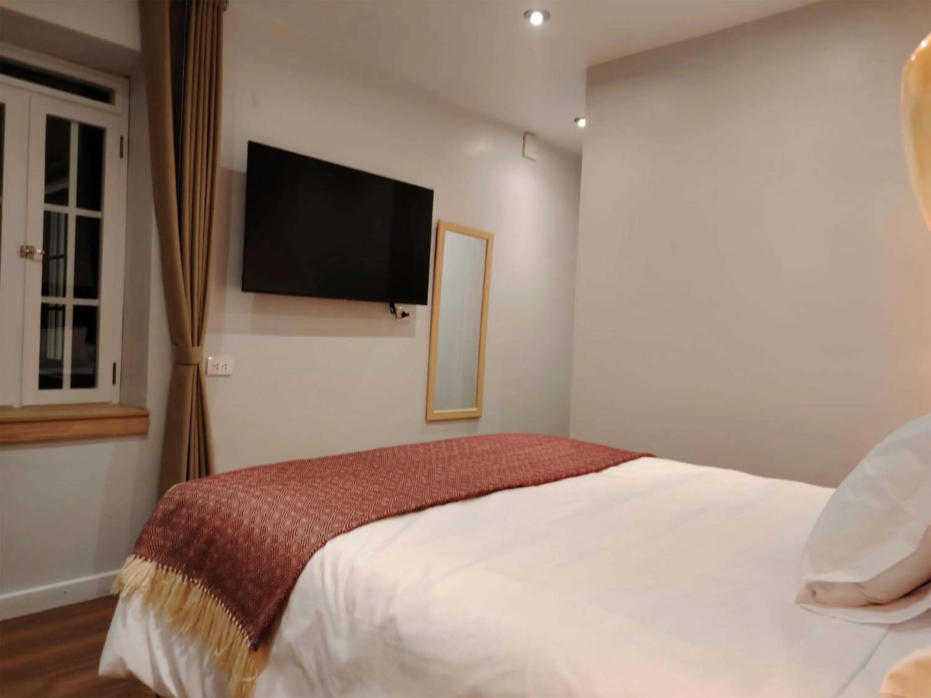 Bed in Casa Cruz Verde by Peru Garden Hotels