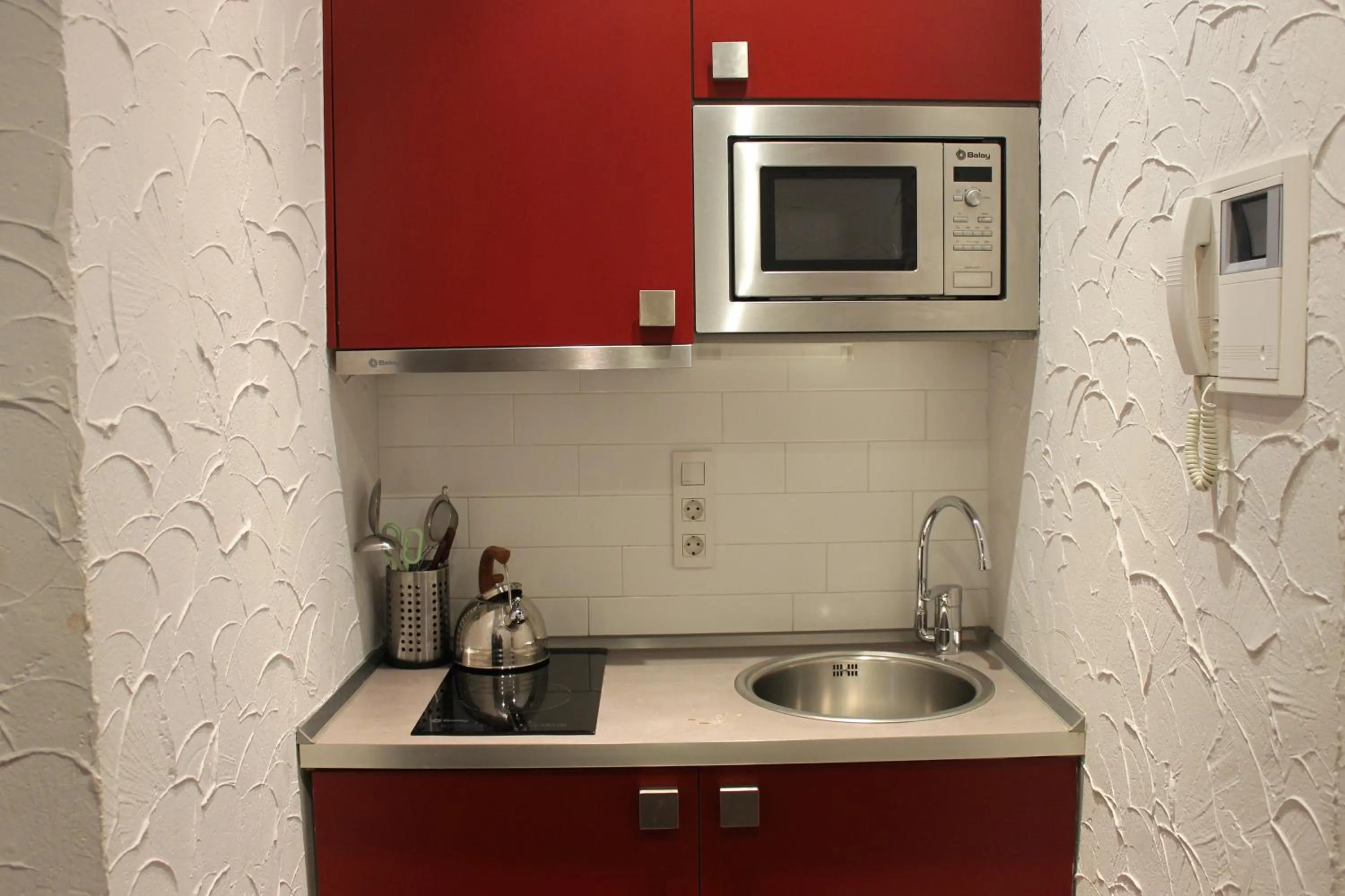 Kitchen or kitchenette in Apartaments Ciutat Vella