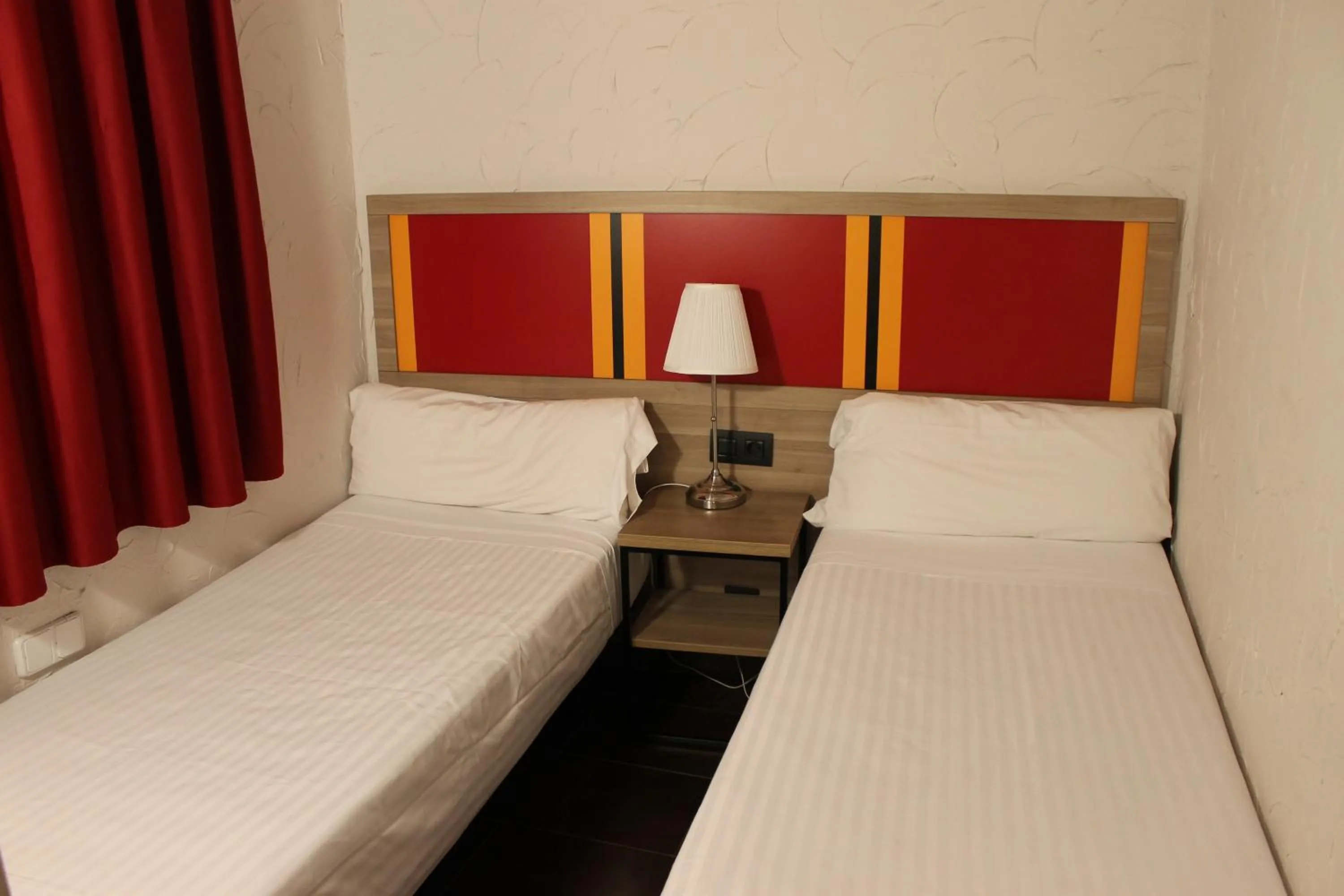 Bedroom, Bed in Apartaments Ciutat Vella