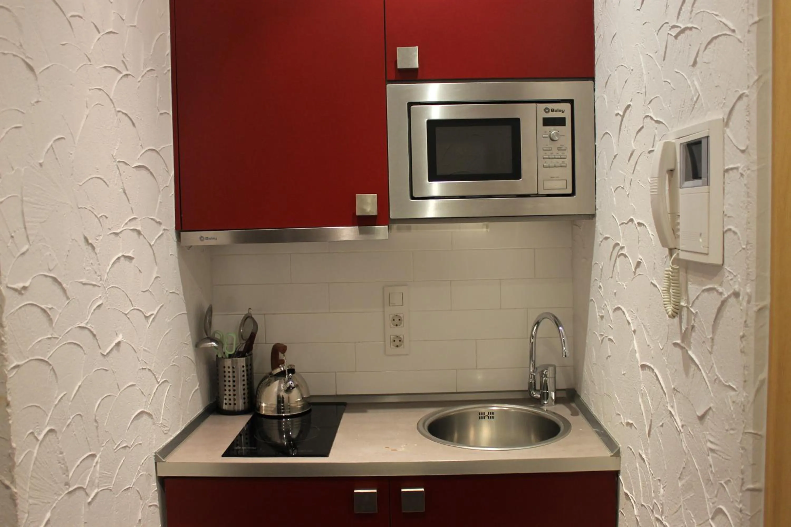 Kitchen or kitchenette in Apartaments Ciutat Vella