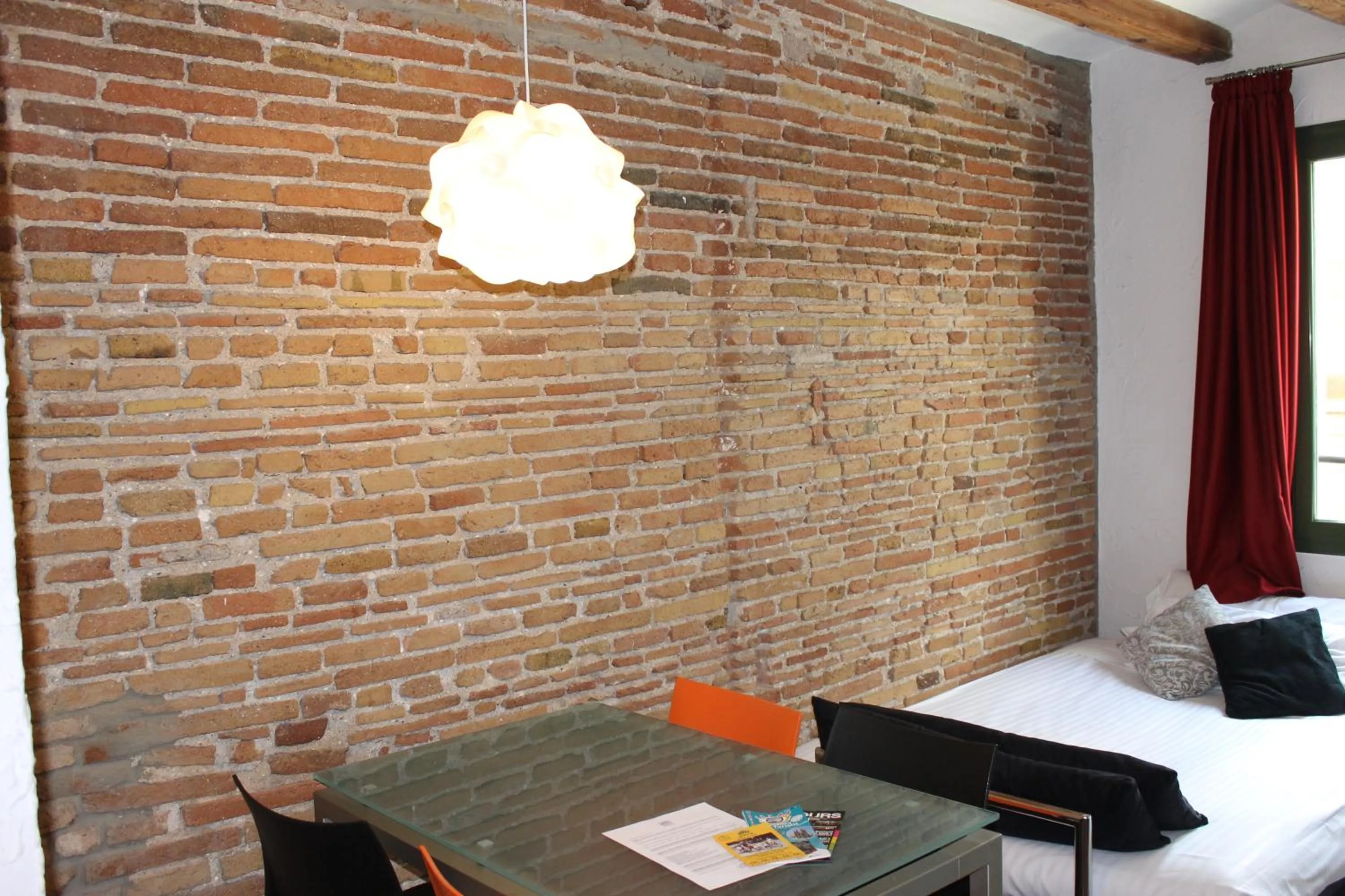 Living room, Bed in Apartaments Ciutat Vella