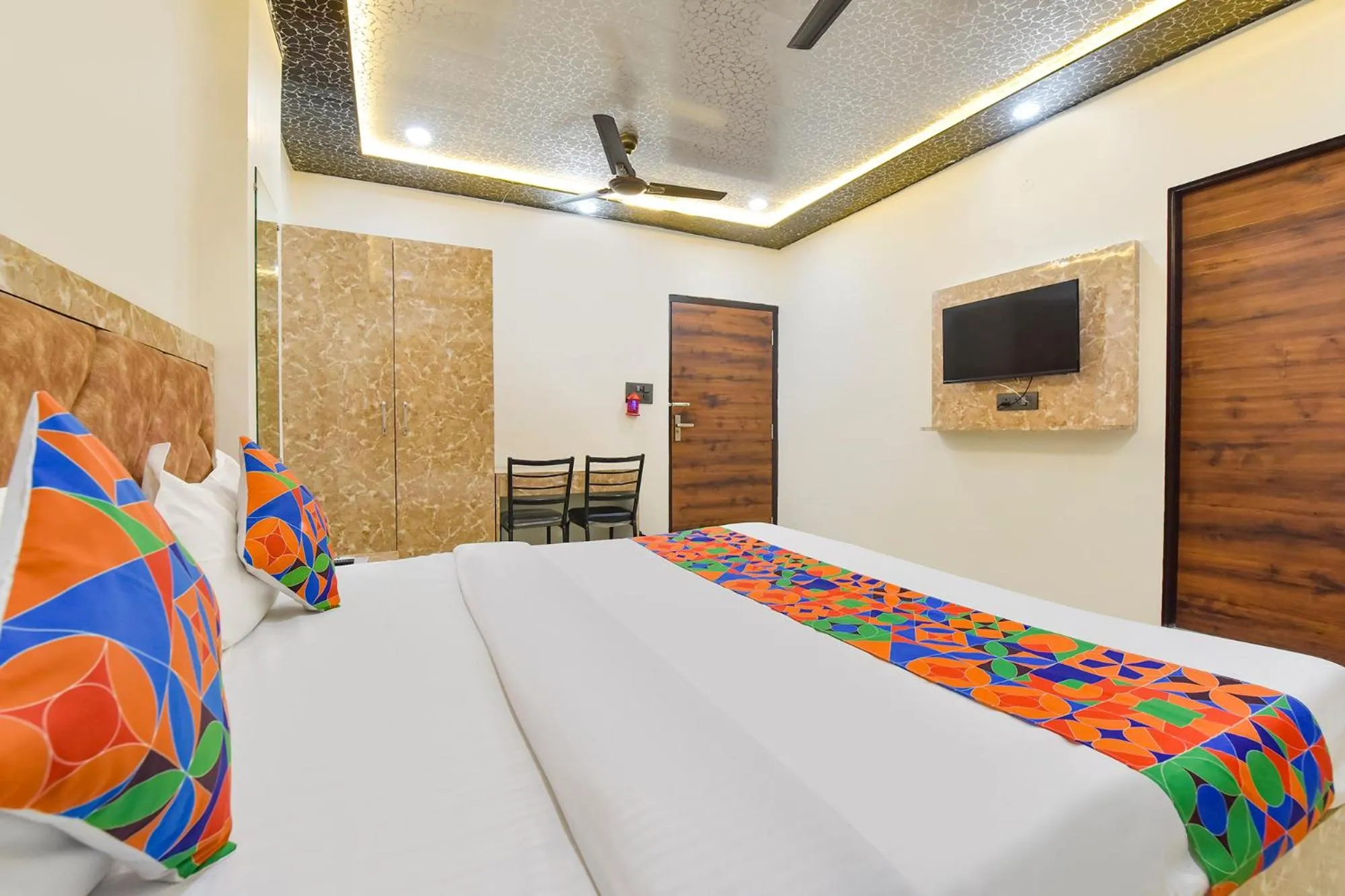 Bed in FabHotel Govindam Royal Stay