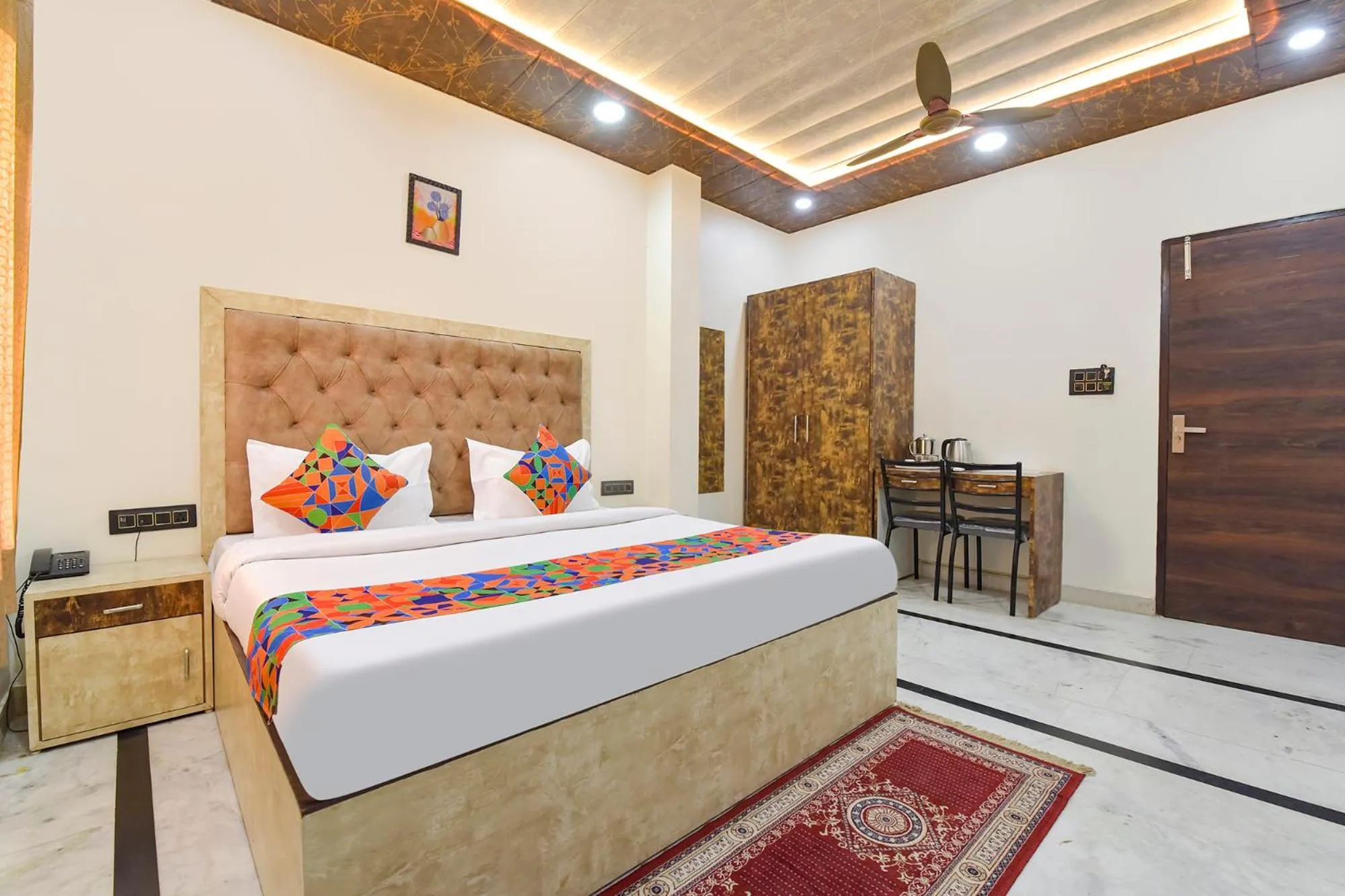 Bed in FabHotel Govindam Royal Stay