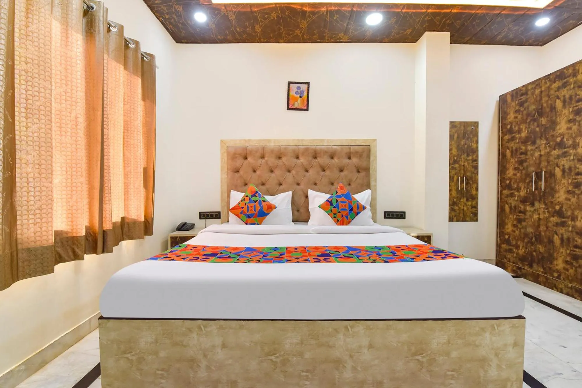 Bed in FabHotel Govindam Royal Stay
