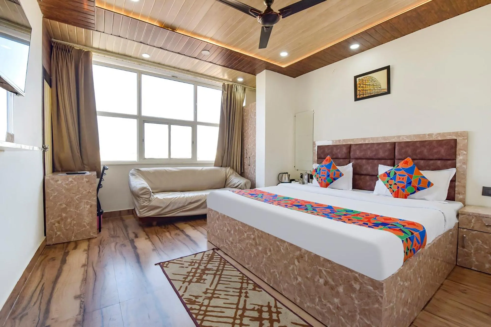 Bed in FabHotel Govindam Royal Stay