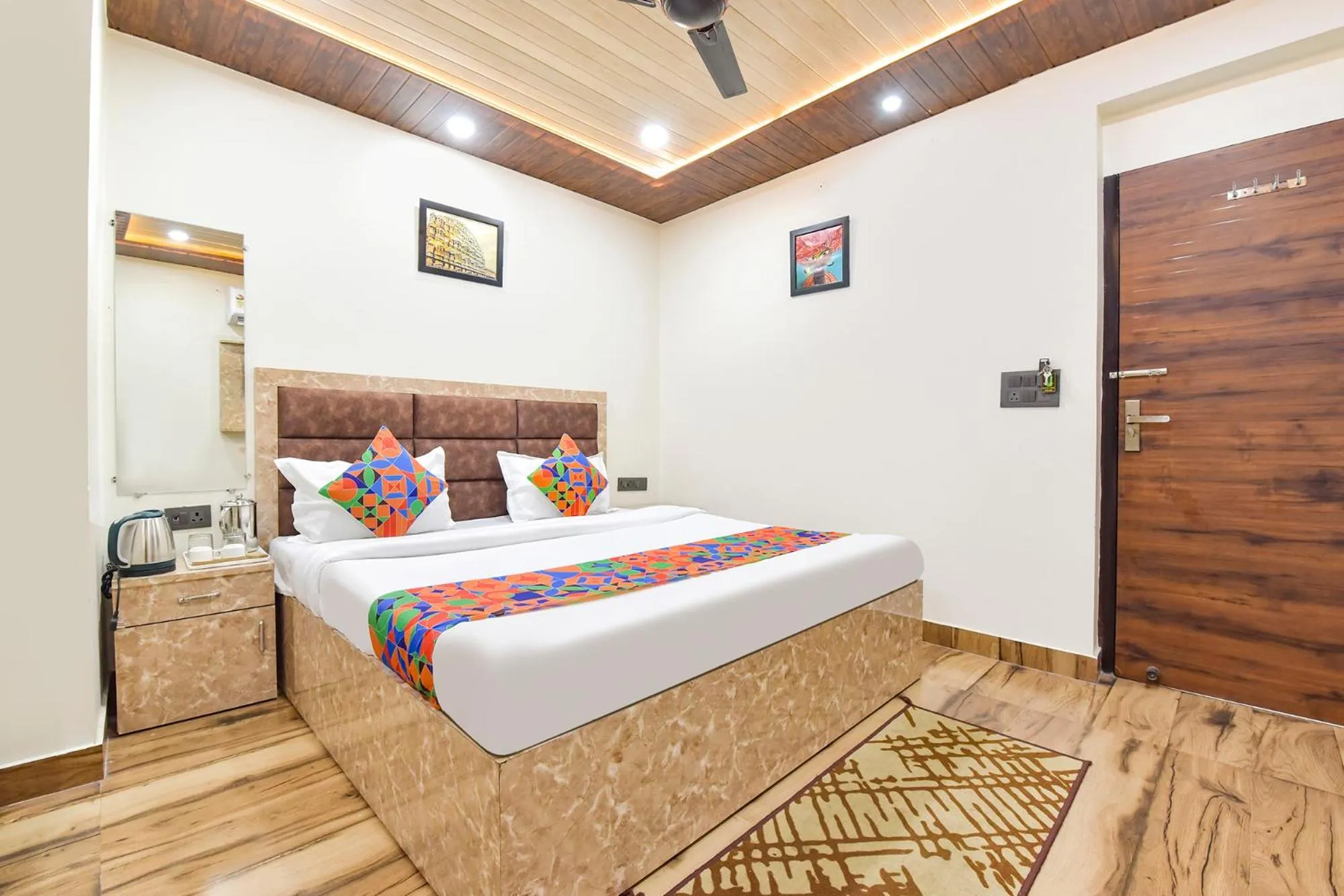 Bed in FabHotel Govindam Royal Stay