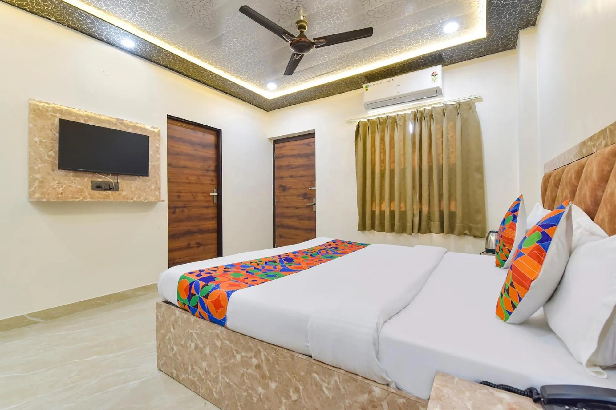 Bed in FabHotel Govindam Royal Stay