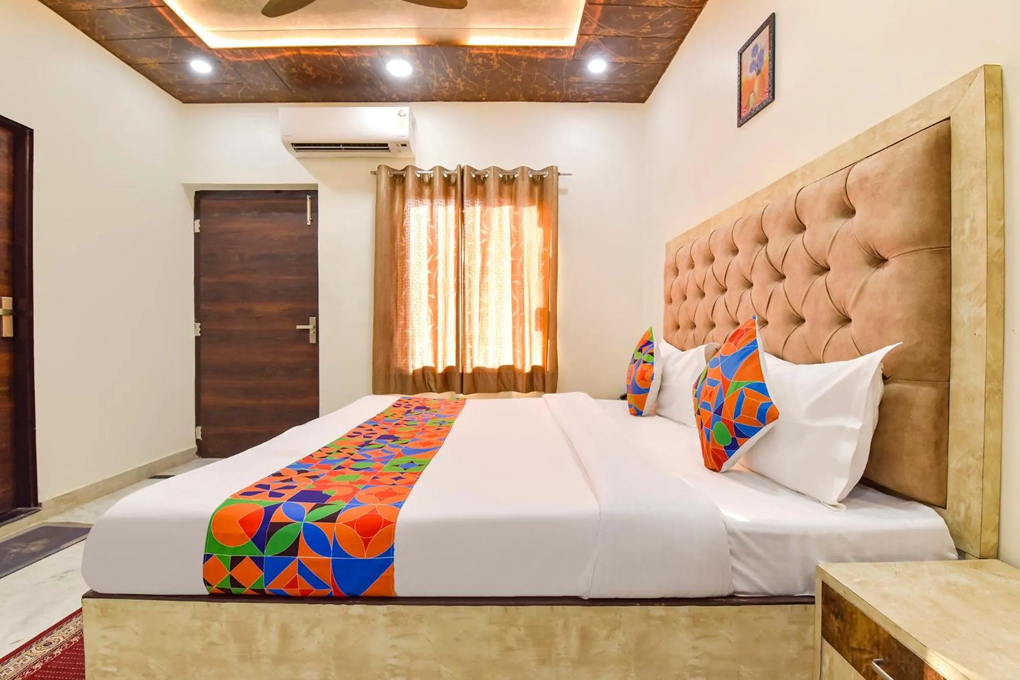 Bed in FabHotel Govindam Royal Stay