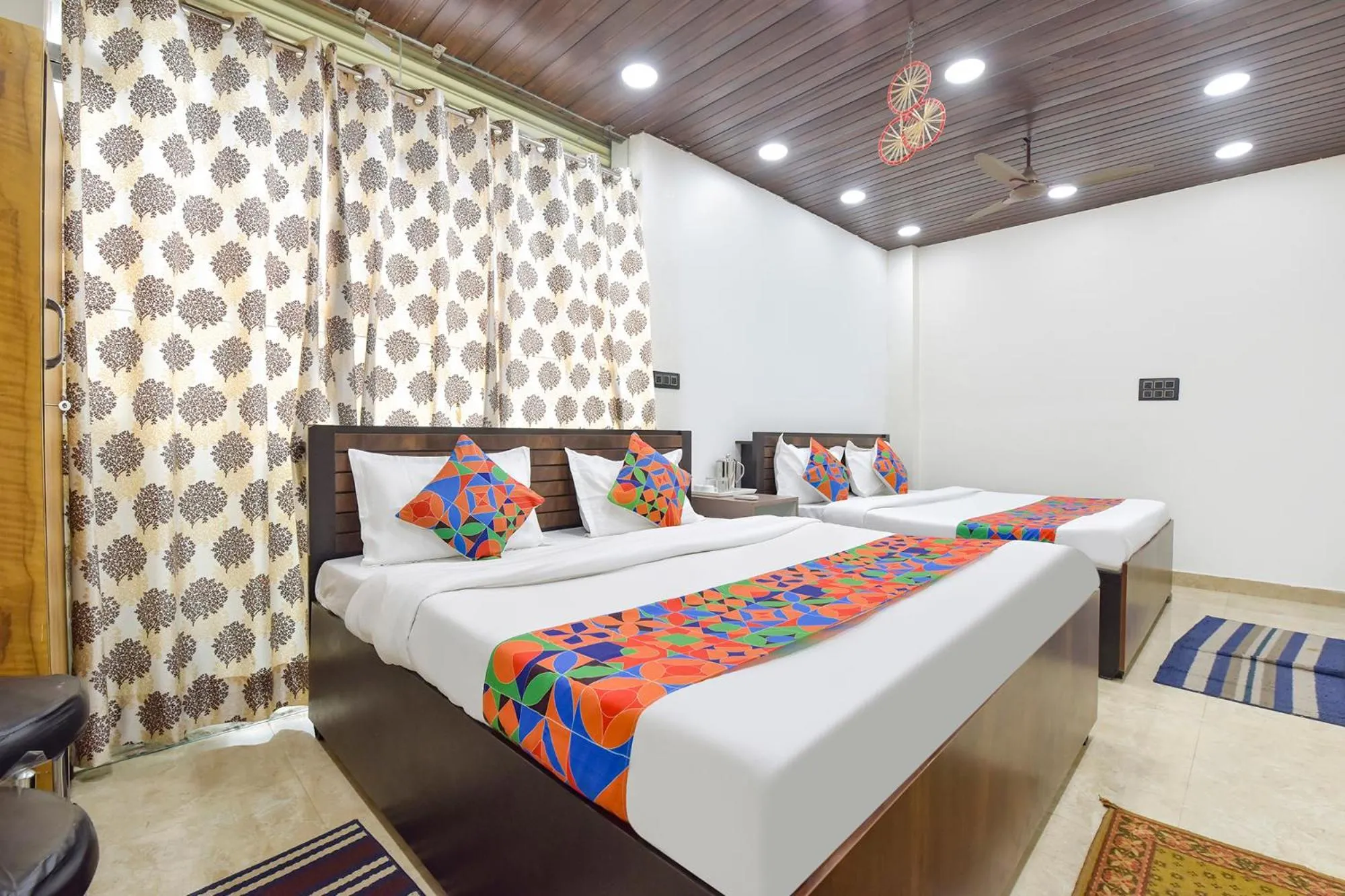 Bed in FabHotel Govindam Royal Stay