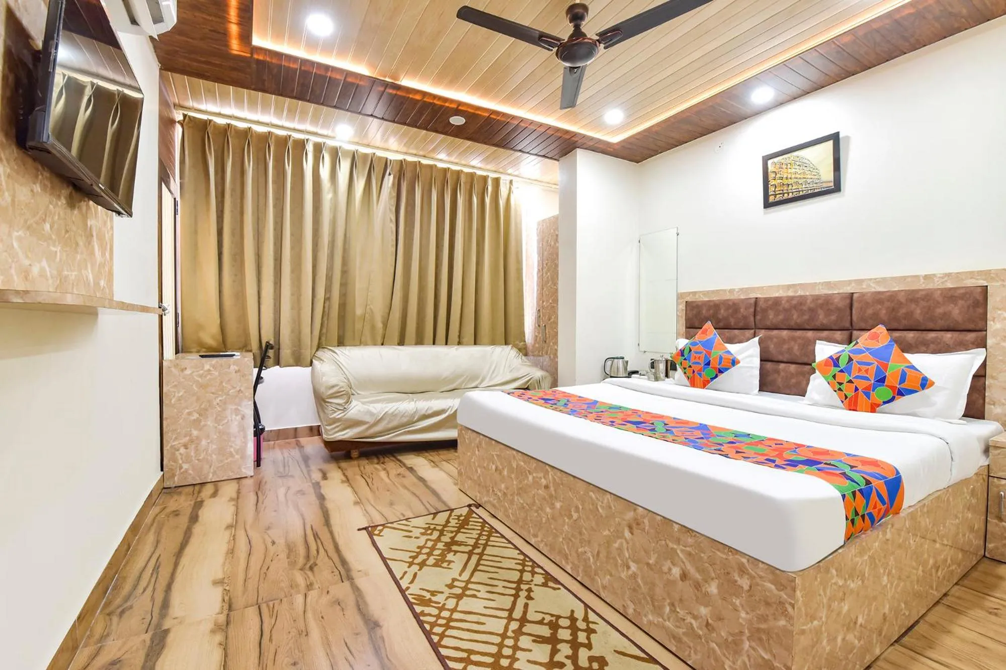 Bed in FabHotel Govindam Royal Stay