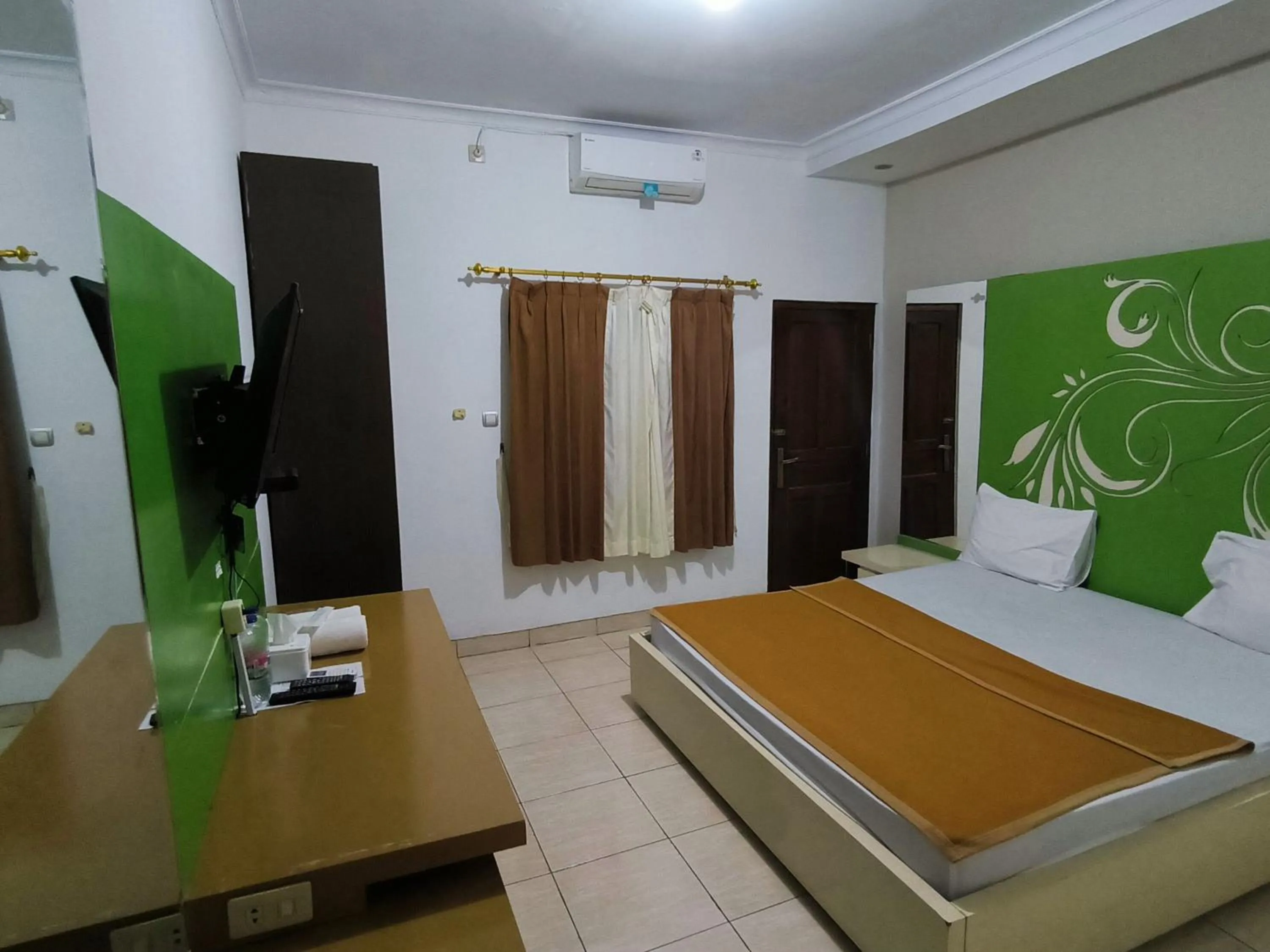 Bed in New Bandengan Beach Hotel