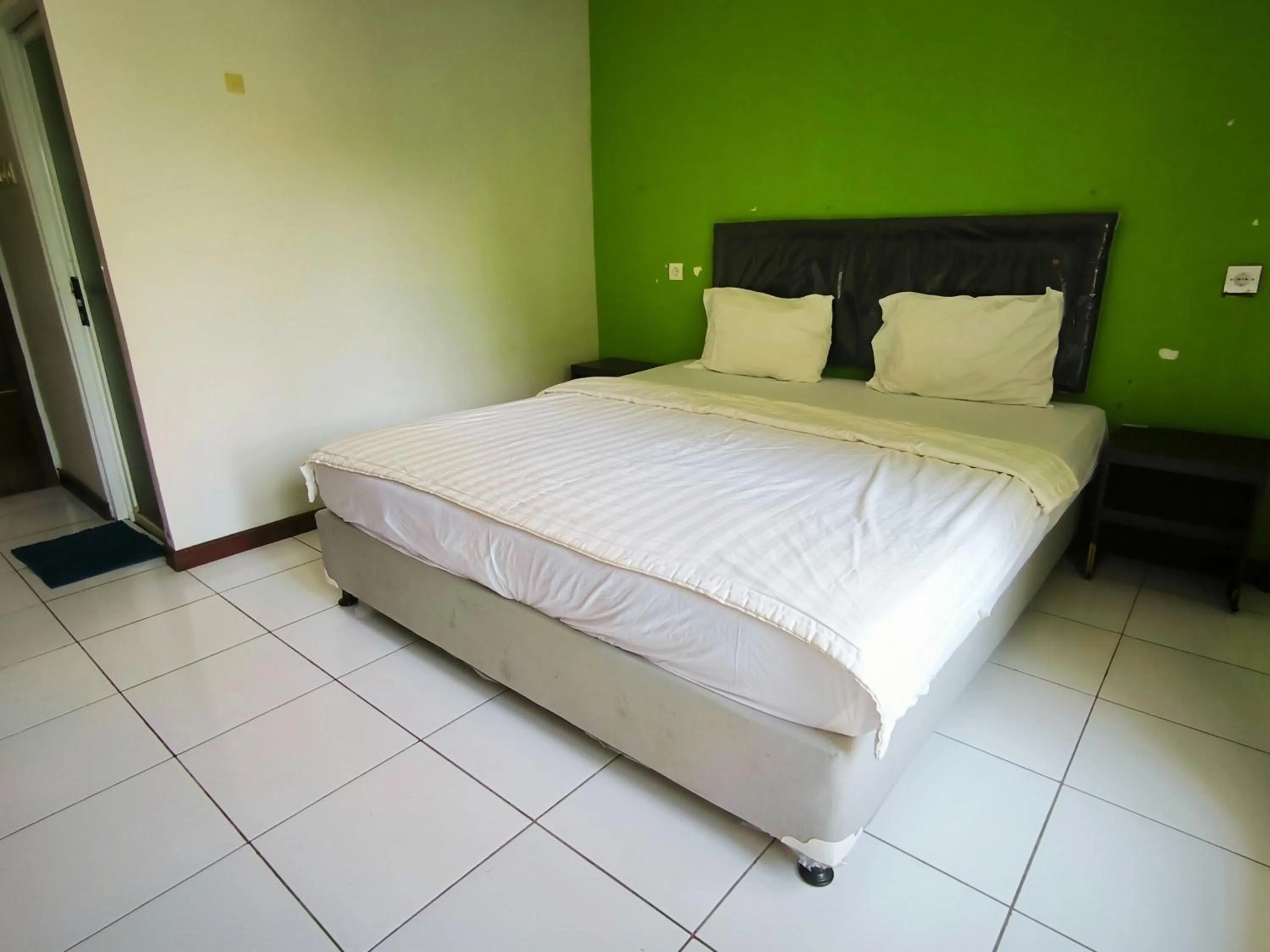 Bed in New Bandengan Beach Hotel