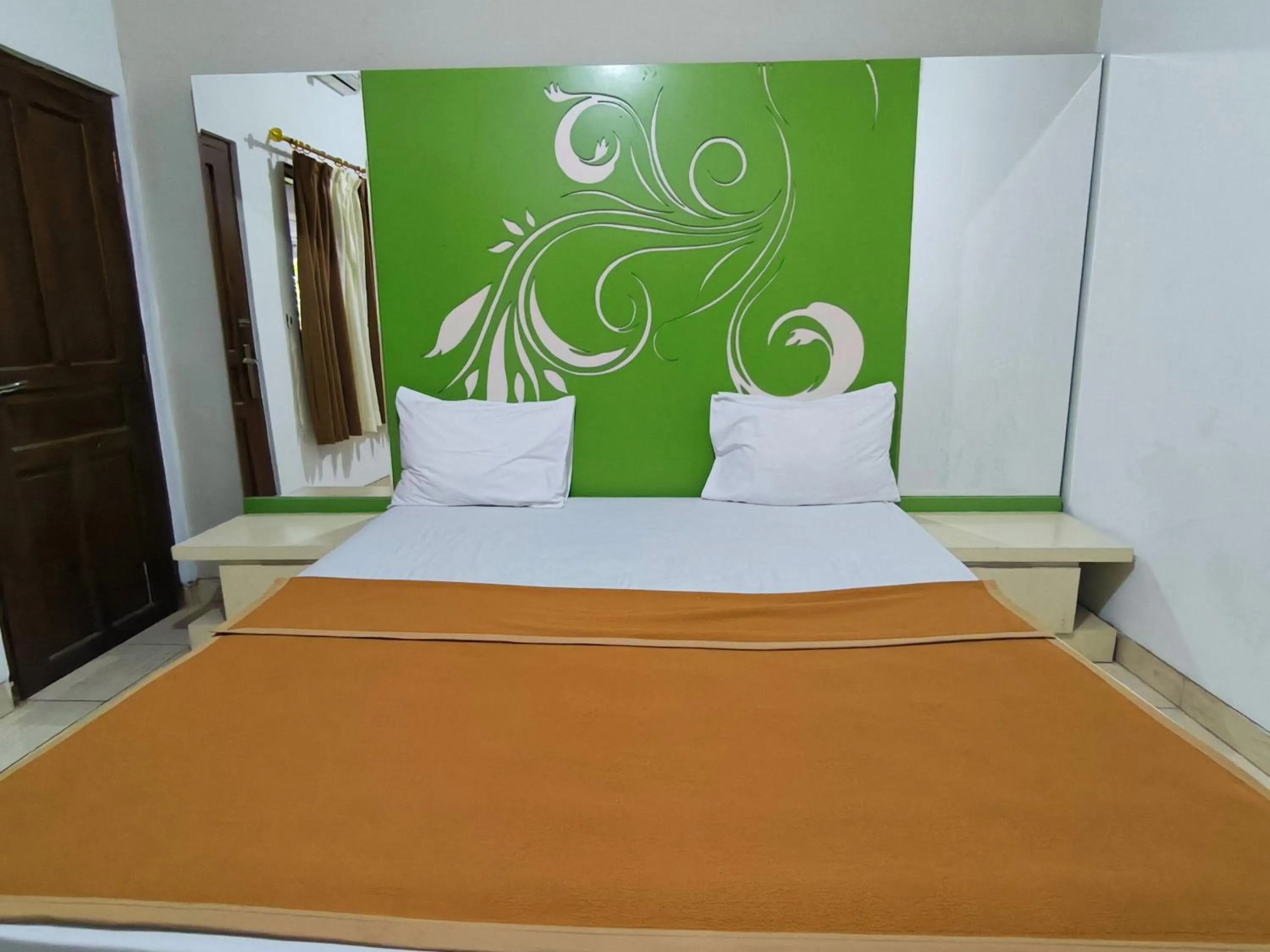 Bed in New Bandengan Beach Hotel