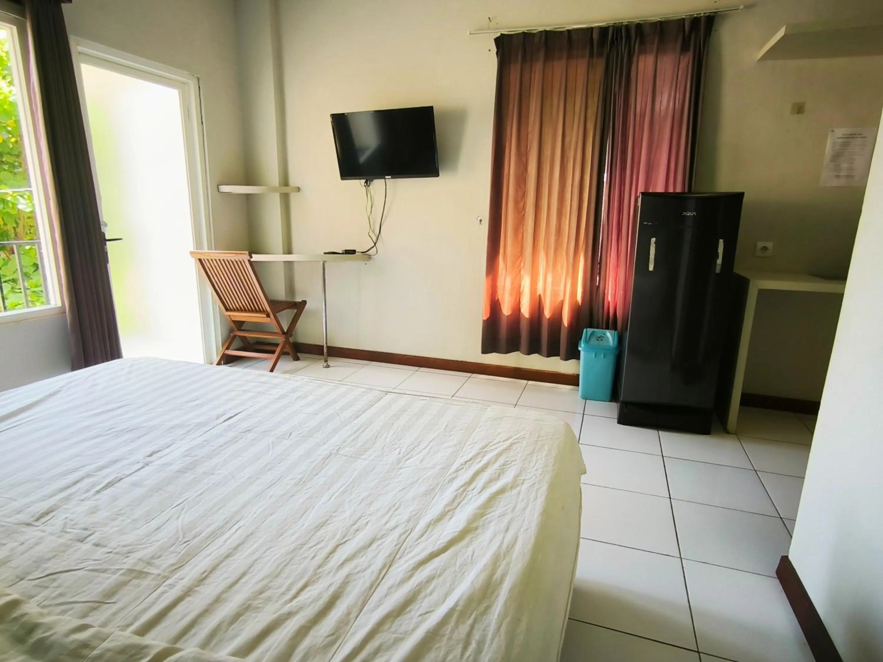 Bed in New Bandengan Beach Hotel