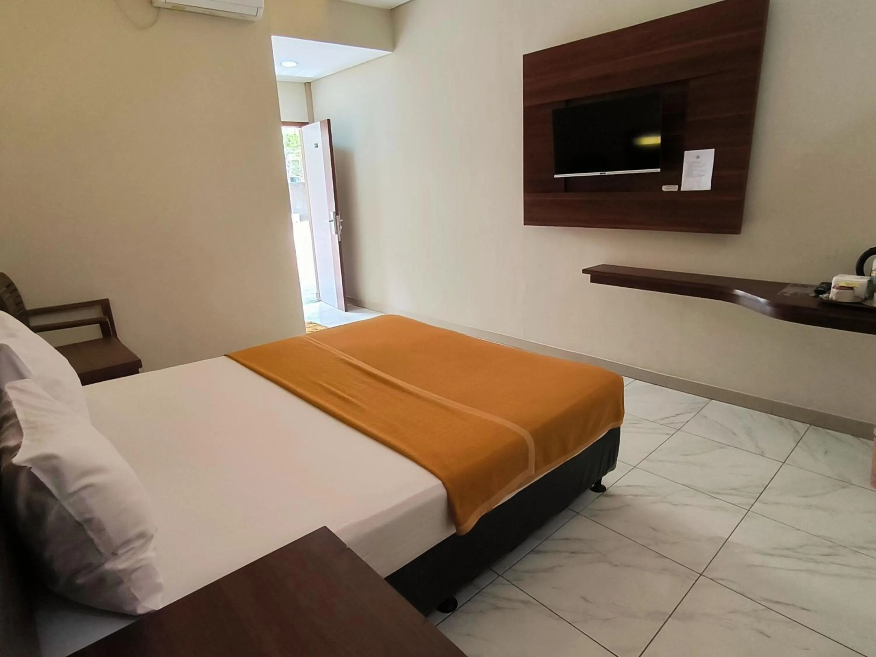 Bed in New Bandengan Beach Hotel