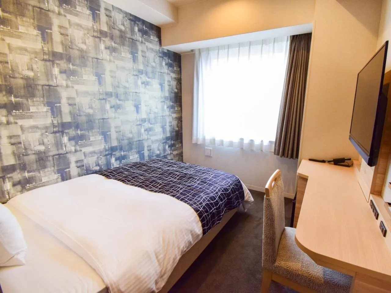 Bed in APA Hotel Kyoto Gojo Omiya