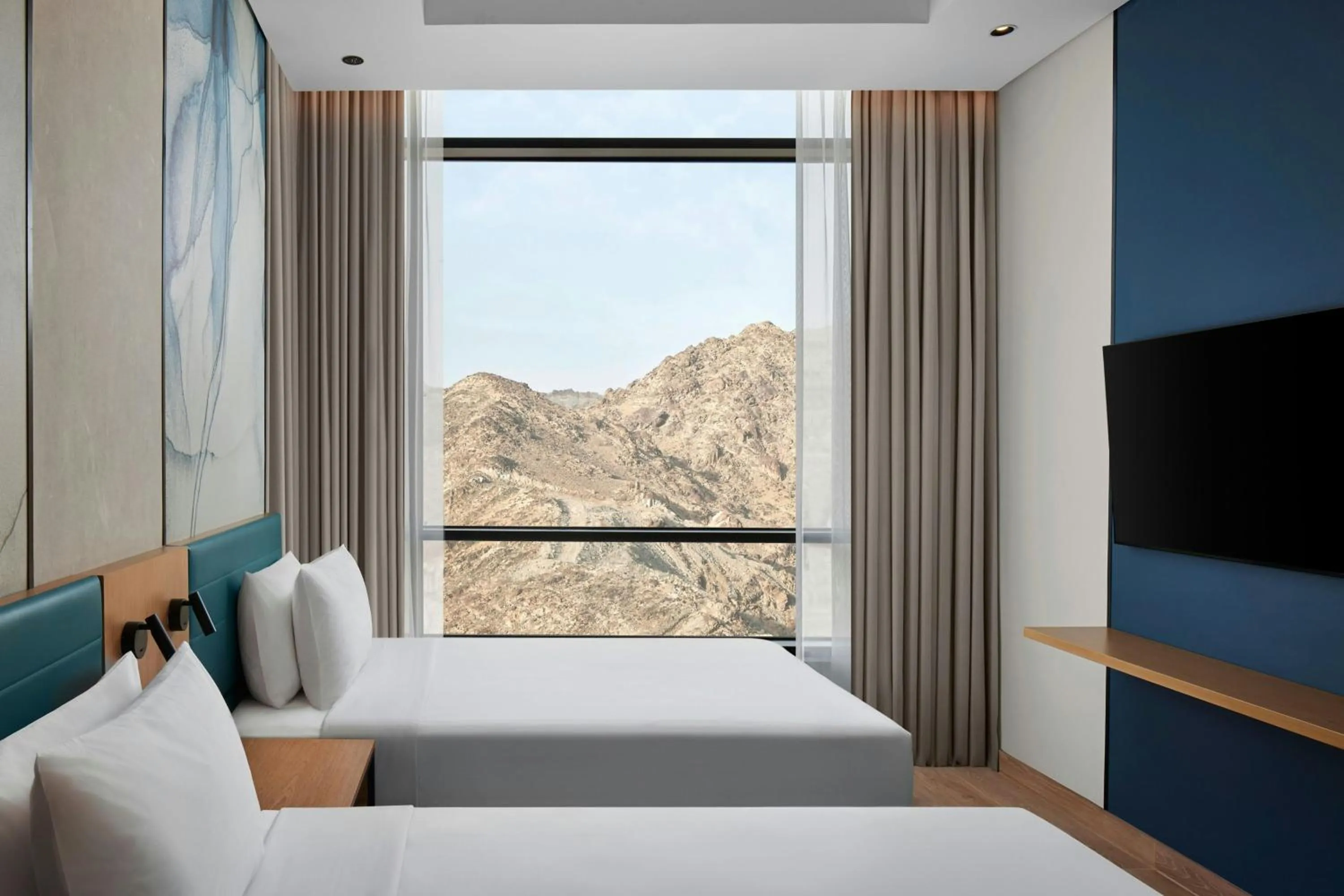 Photo of the whole room, Bed in Courtyard by Marriott Makkah