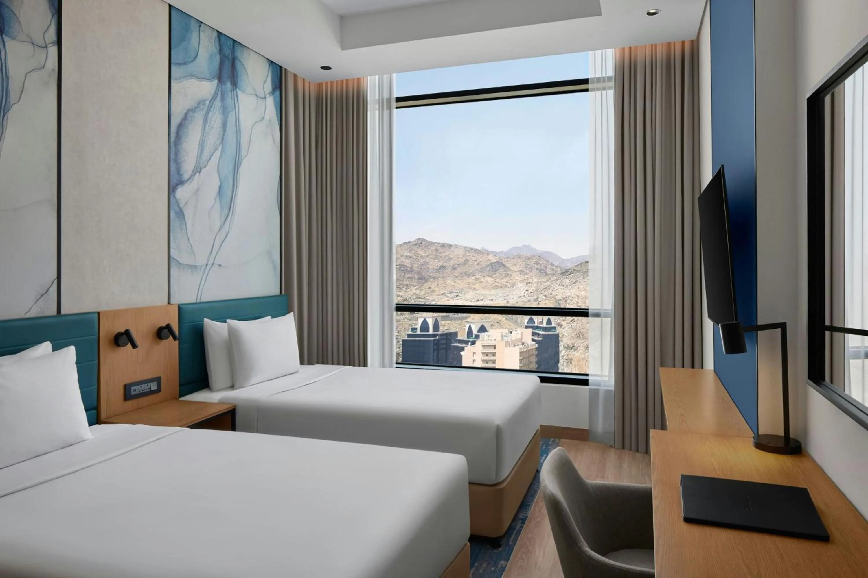 Bedroom, Bed in Courtyard by Marriott Makkah